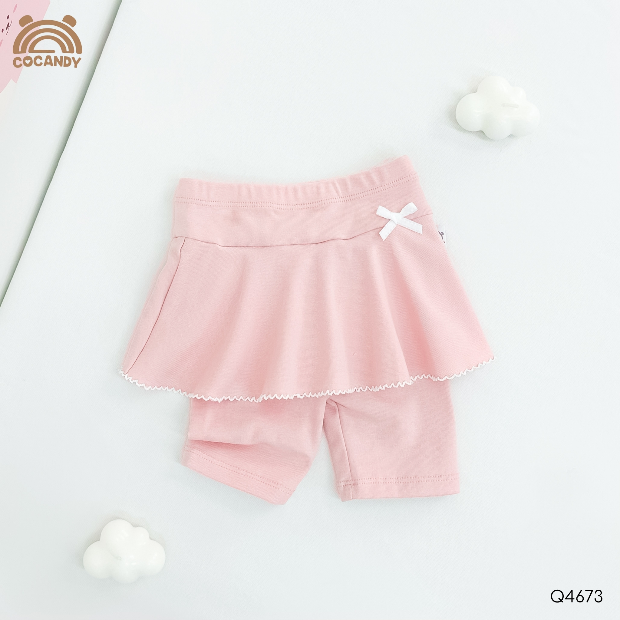 Quần váy legging lửng HỒNG viền sóng phối nơ nhỏ