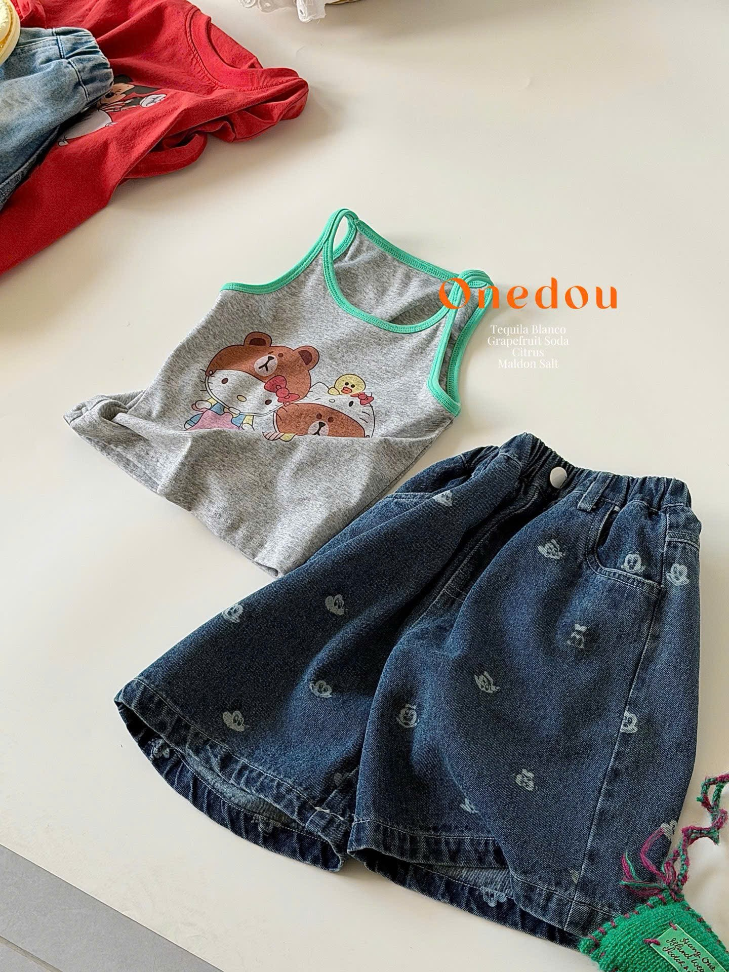 OD05 -Quần bò dáng lửng hoạ tiết chấm tua rua hãng One Dou