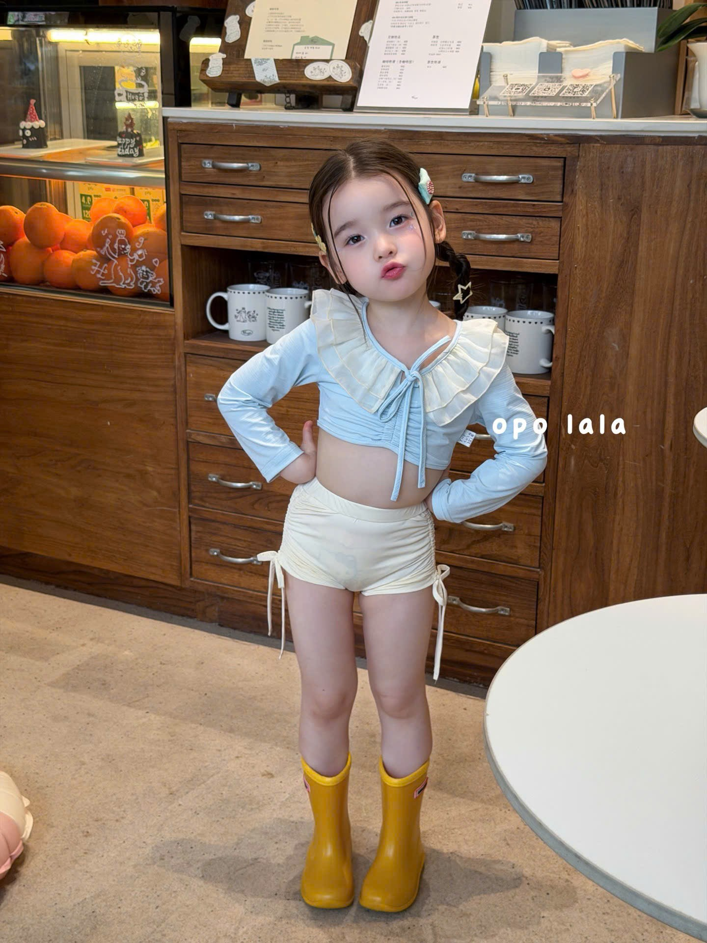 B11 - Set bơi 2 chi tiết dài tay xanh cổ bèo voan kèm quần kem hãng OPL