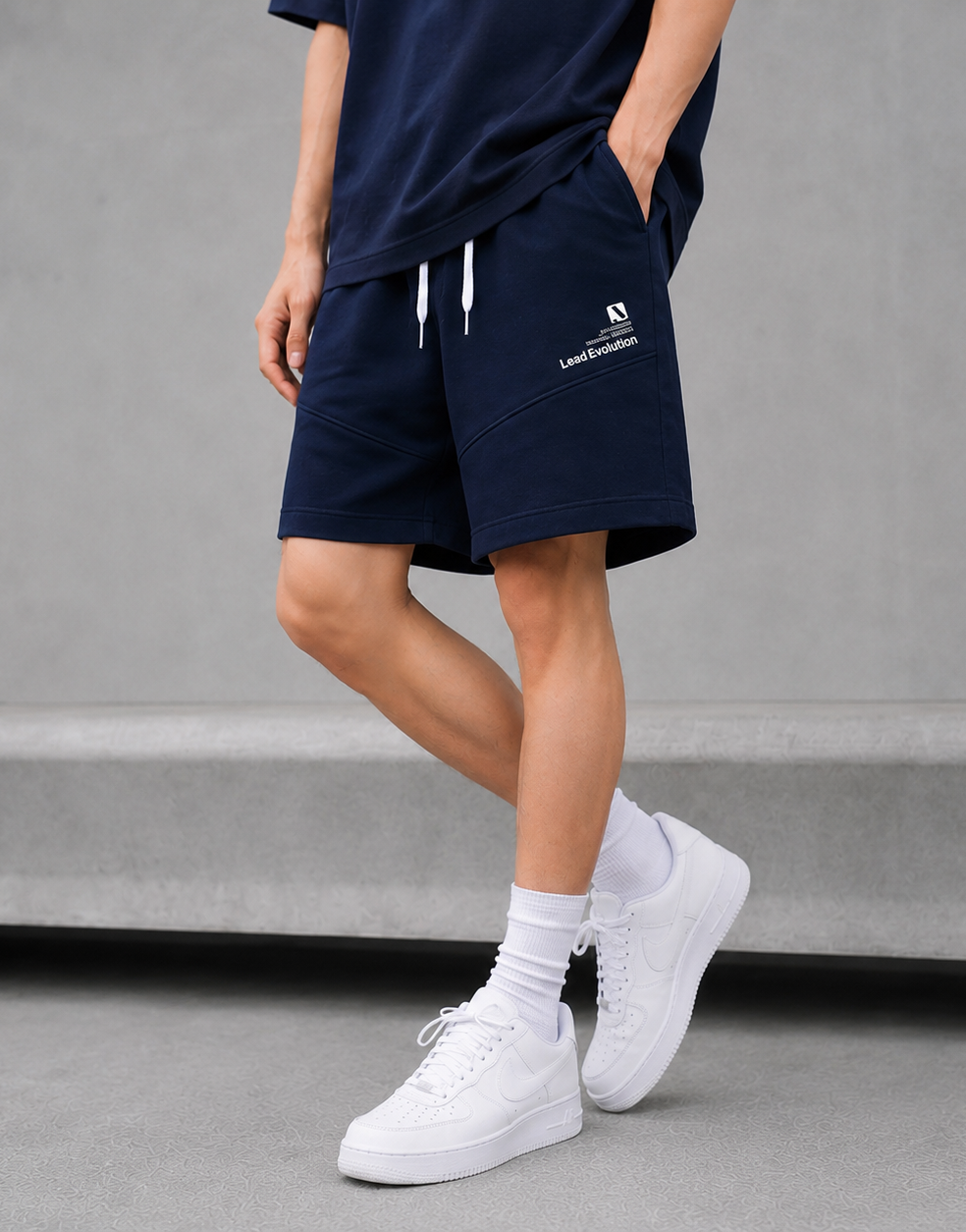 Quần short nỉ bé trai màu xanh đen phối ống