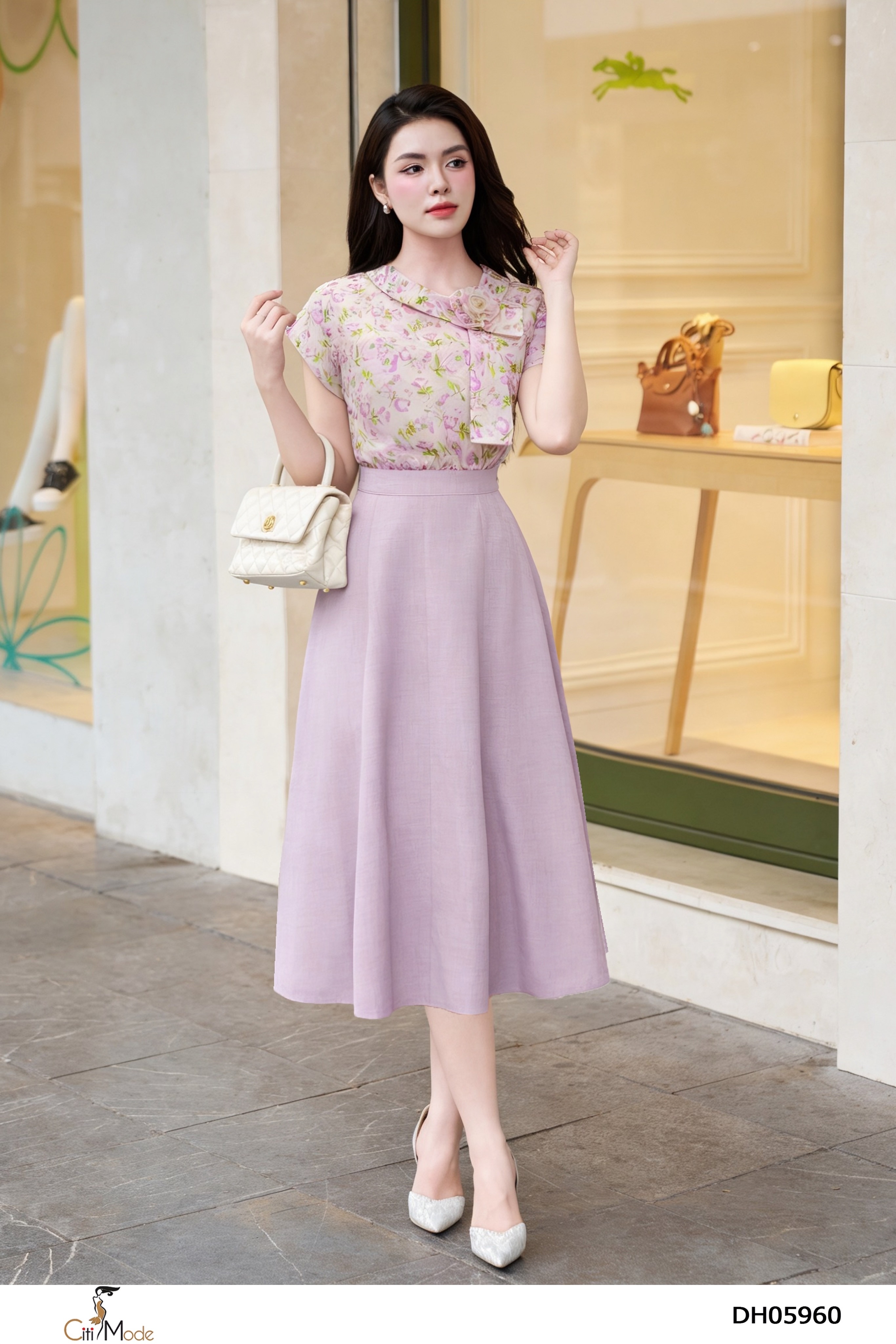 Đầm xòe hoa tím cổ nơ hoa cách điệu