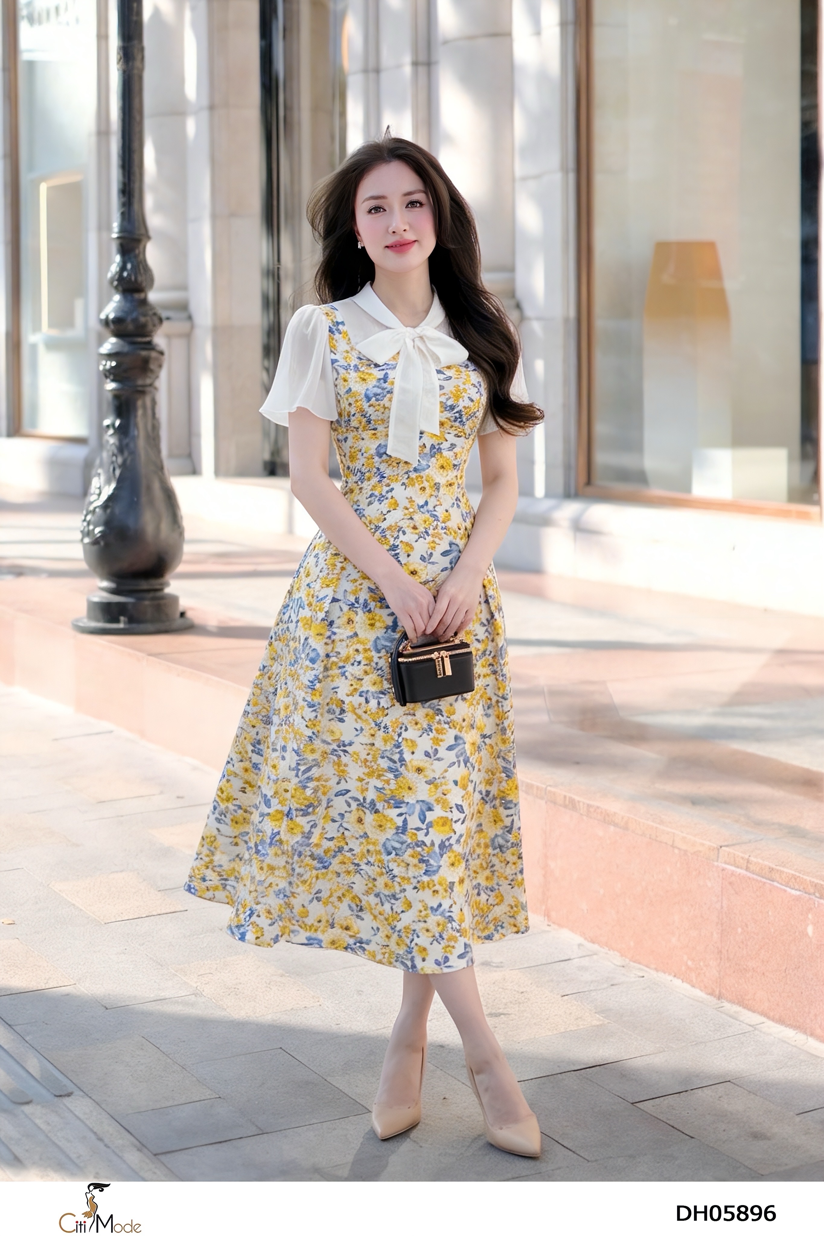 Đầm xòe hoa vàng cổ nơ trắng tay cọc