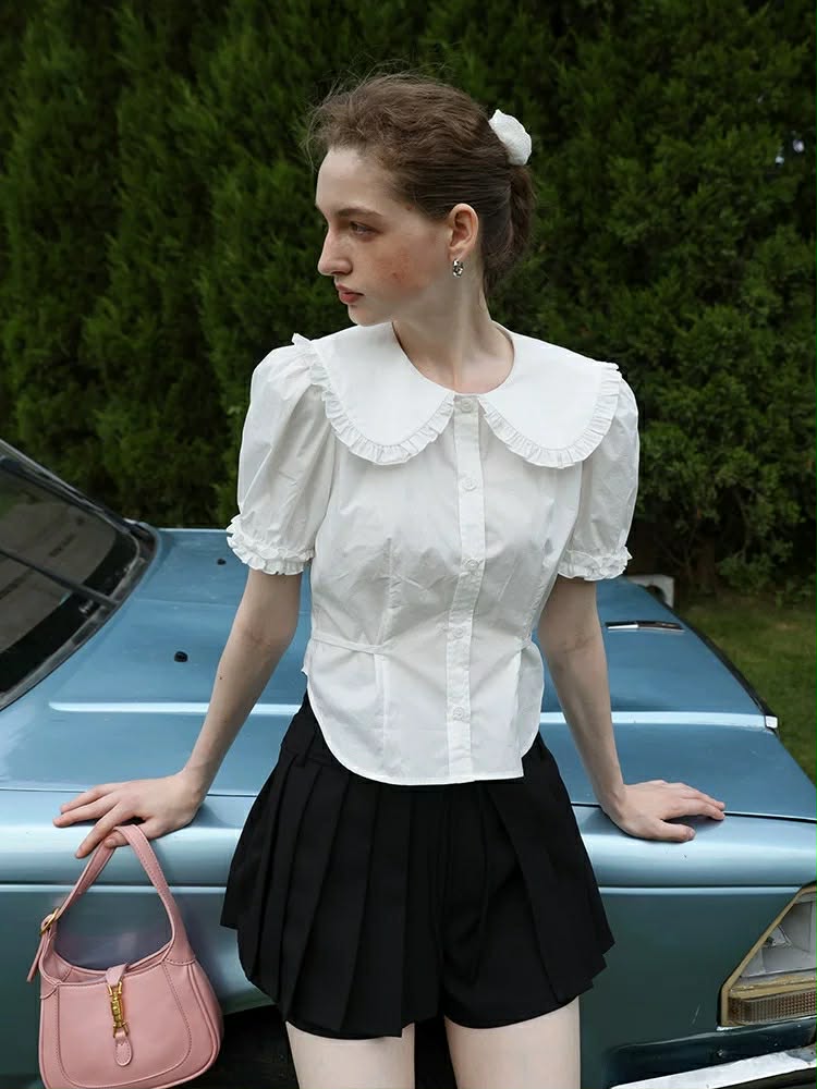 Áo sơ mi cộc tay bồng viền nhún cổ tay, cổ sen bẻ viền xếp dây buộc eo cài cúc
