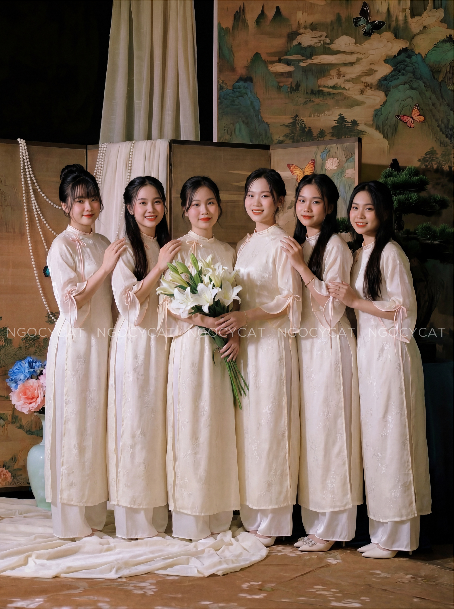 Áo Dài Bưng Quả Màu Be Châu Sa Cổ Tròn Tay Tơ Xẻ Nơ_thumbnail_1