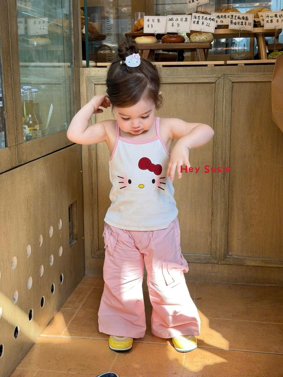 HS12 - Áo 2 dây hồng hoạ tiết kitty lưng đính cánh tiên hãng Hey Susie