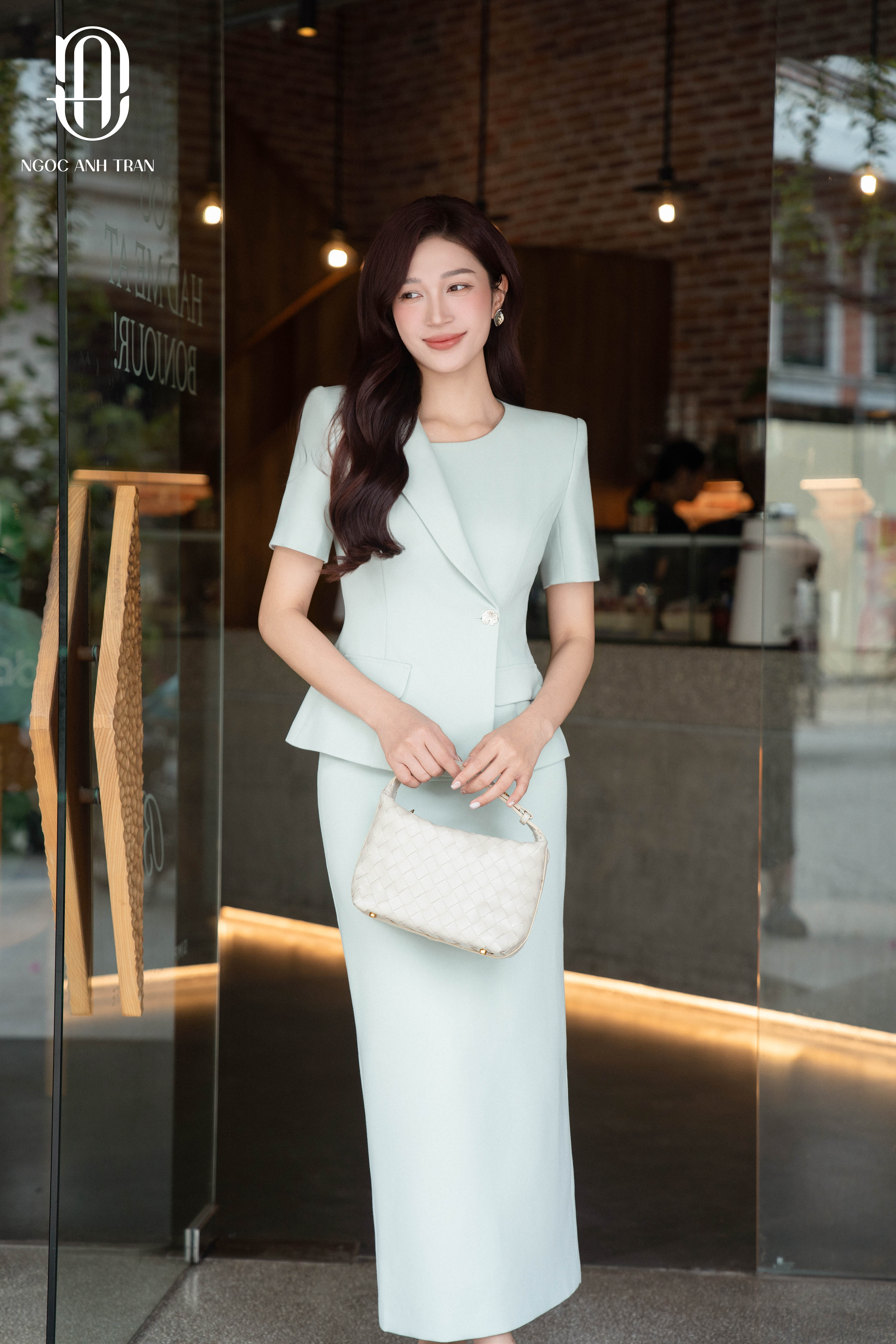 V076 - Áo vest xanh mint cúc lệch