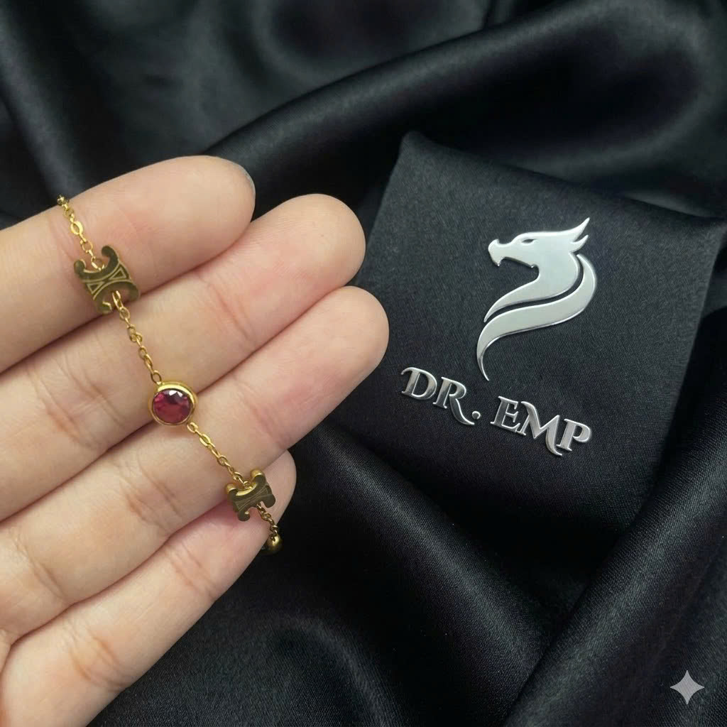 Vòng tay titan vàng hiệu celine đá 2 màu.