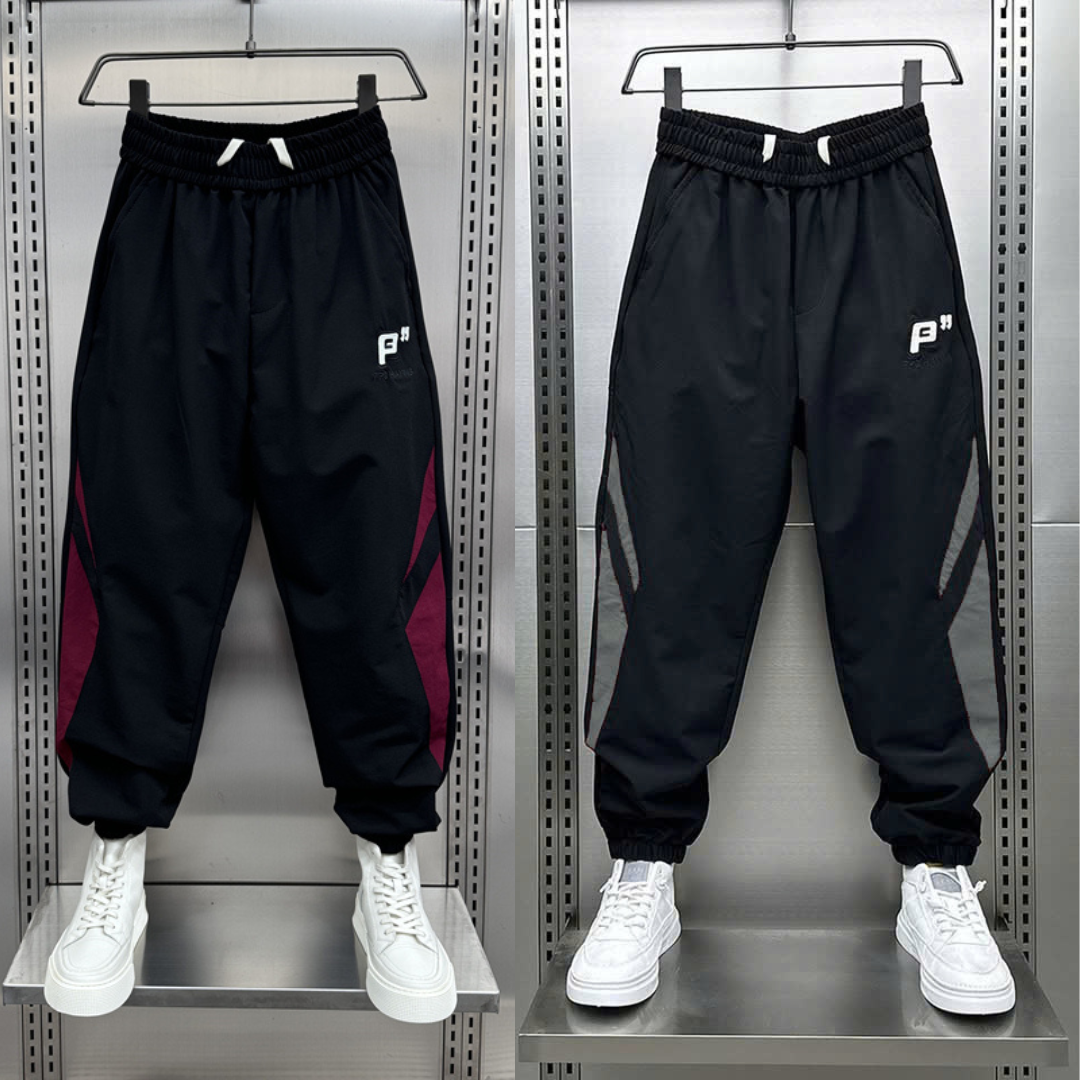 Quần Gió Jogger Unisex Cao Cấp – Vải Gió Hạt Mịn Nhẹ, Bo Gấu Co Giãn, Phong Cách Năng Động - QH05_thumbnail_4