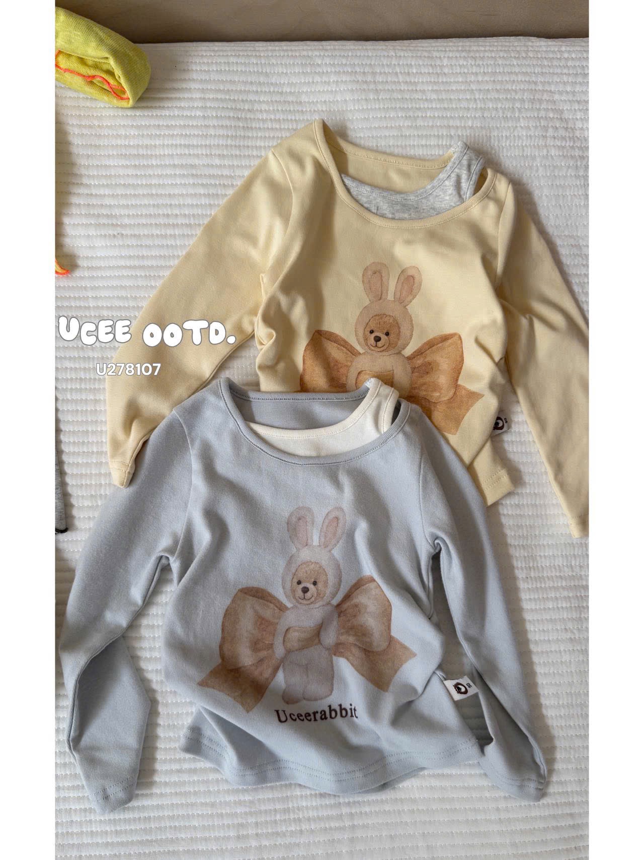 UC26 - Áo giữ nhiệt cổ lệch hoạ tiết nơ màu xanh UCEE 278107