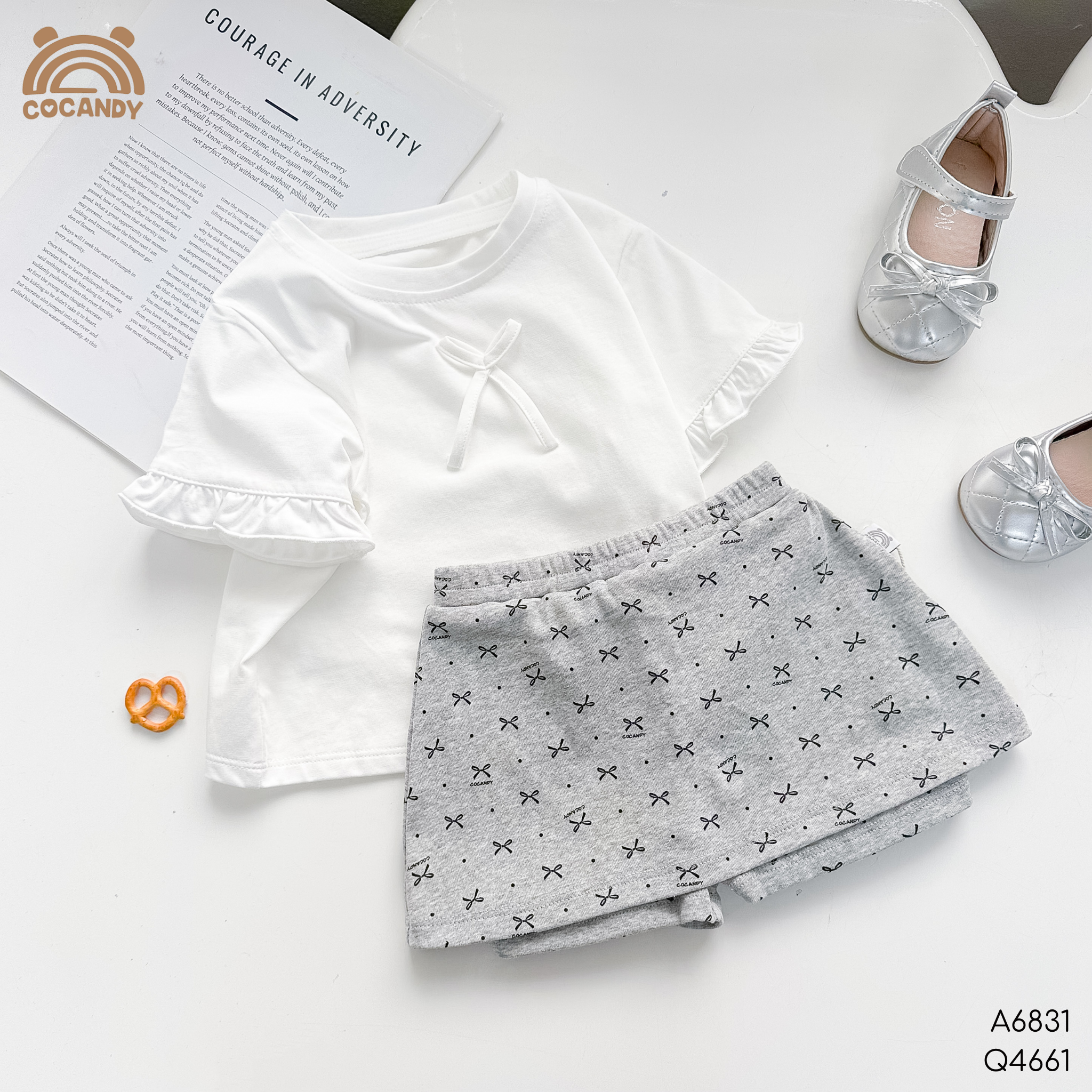 Quần váy legging cộc XÁM họa tiết nơ Cocandy