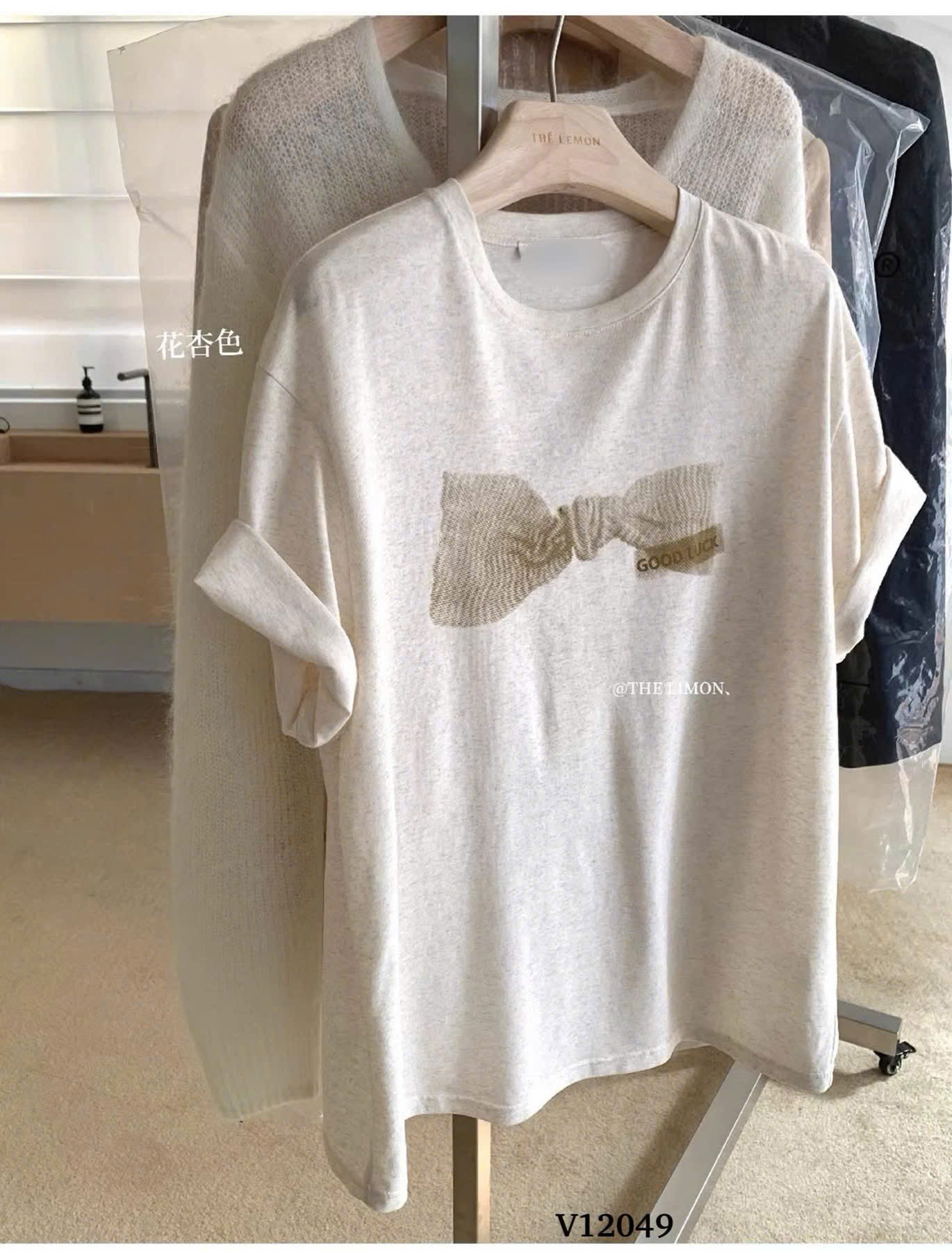 HA395 - Áo phông xước in nơ