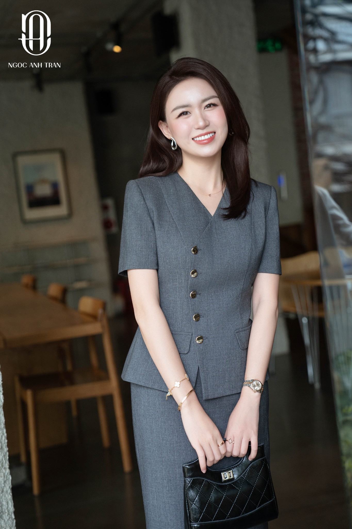 A279 - Áo xám tay cộc khoá đồng