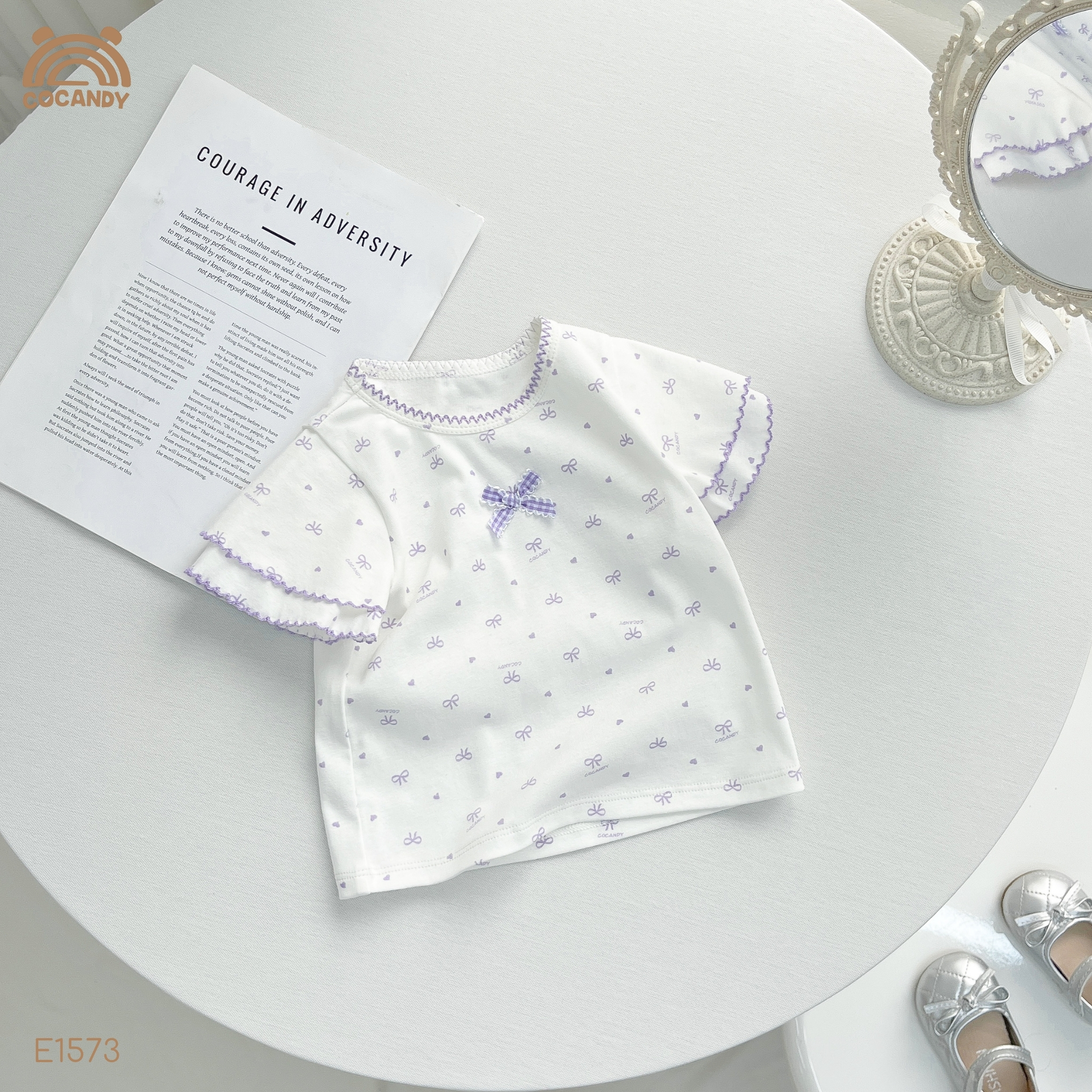 Áo cộc thun TRẮNG hình nơ bi TÍM CCD