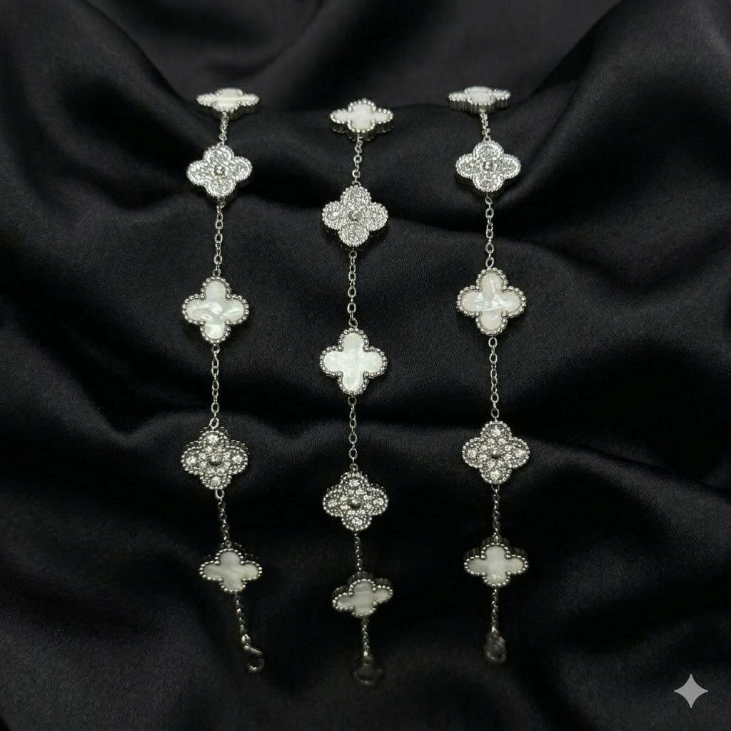 Vòng tay van cleef đá trăng xen kẽ đá kim cương màu bạc