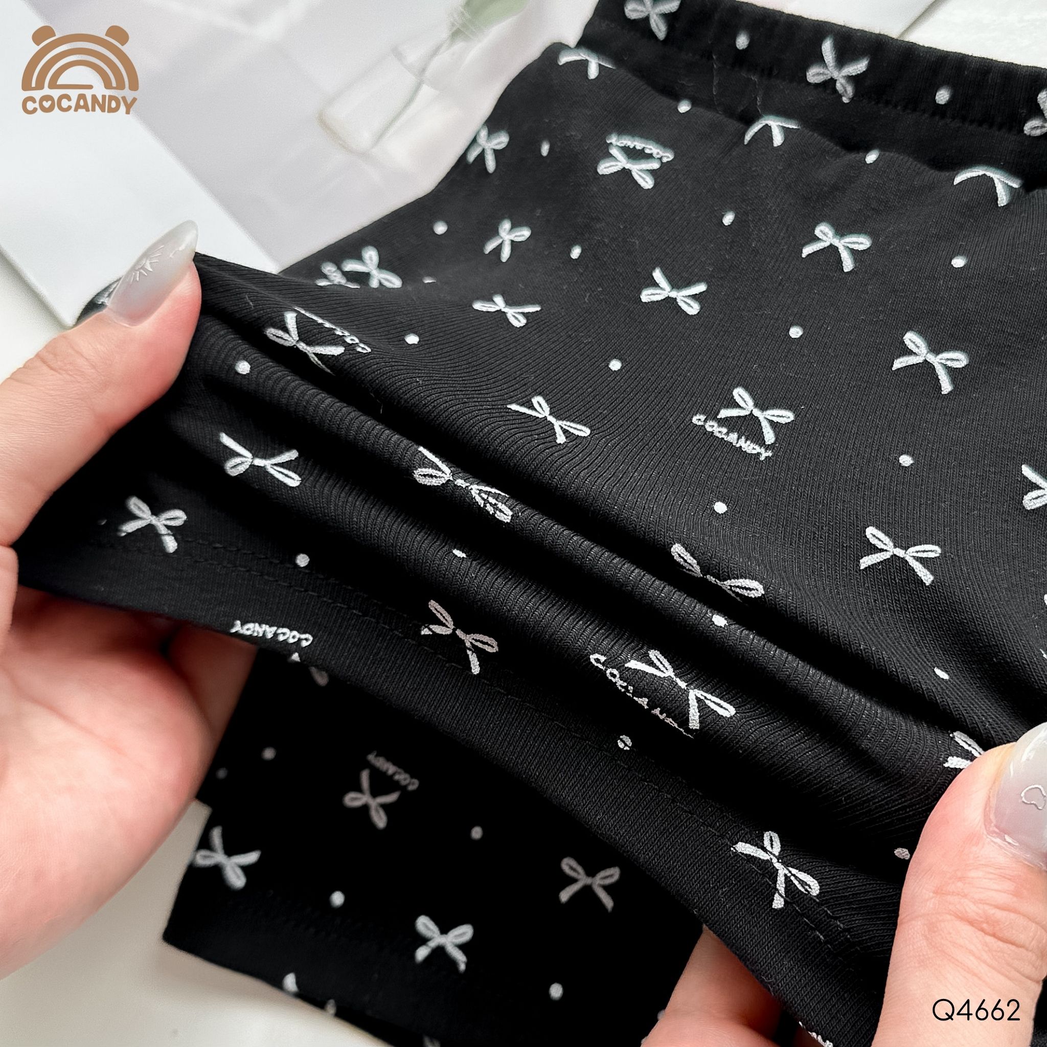 Quần váy legging cộc ĐEN họa tiết nơ Cocandy_thumbnail_2