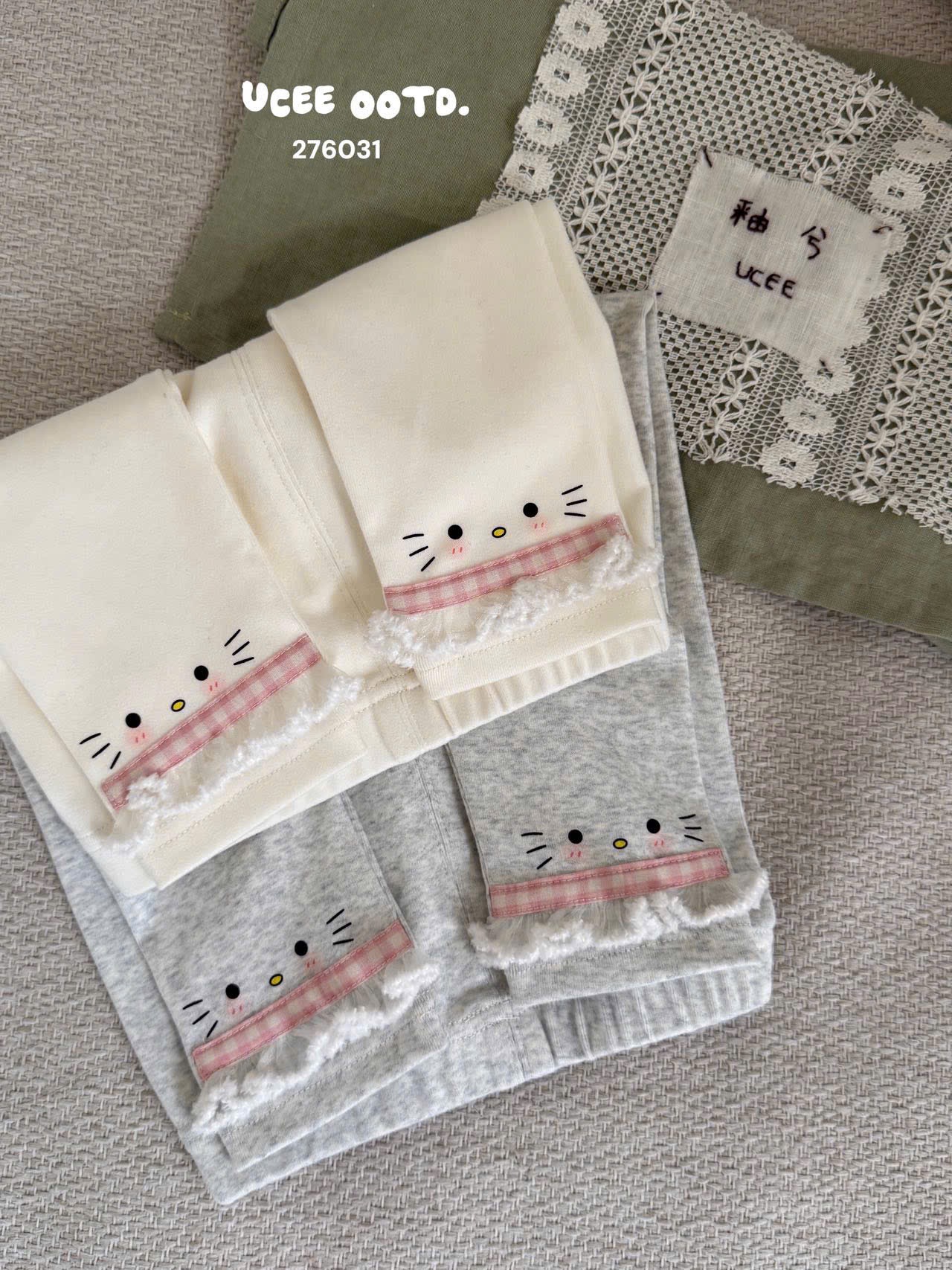 UC45 - Quần legging thêu mặt mèo 2 màu UCEE 276031