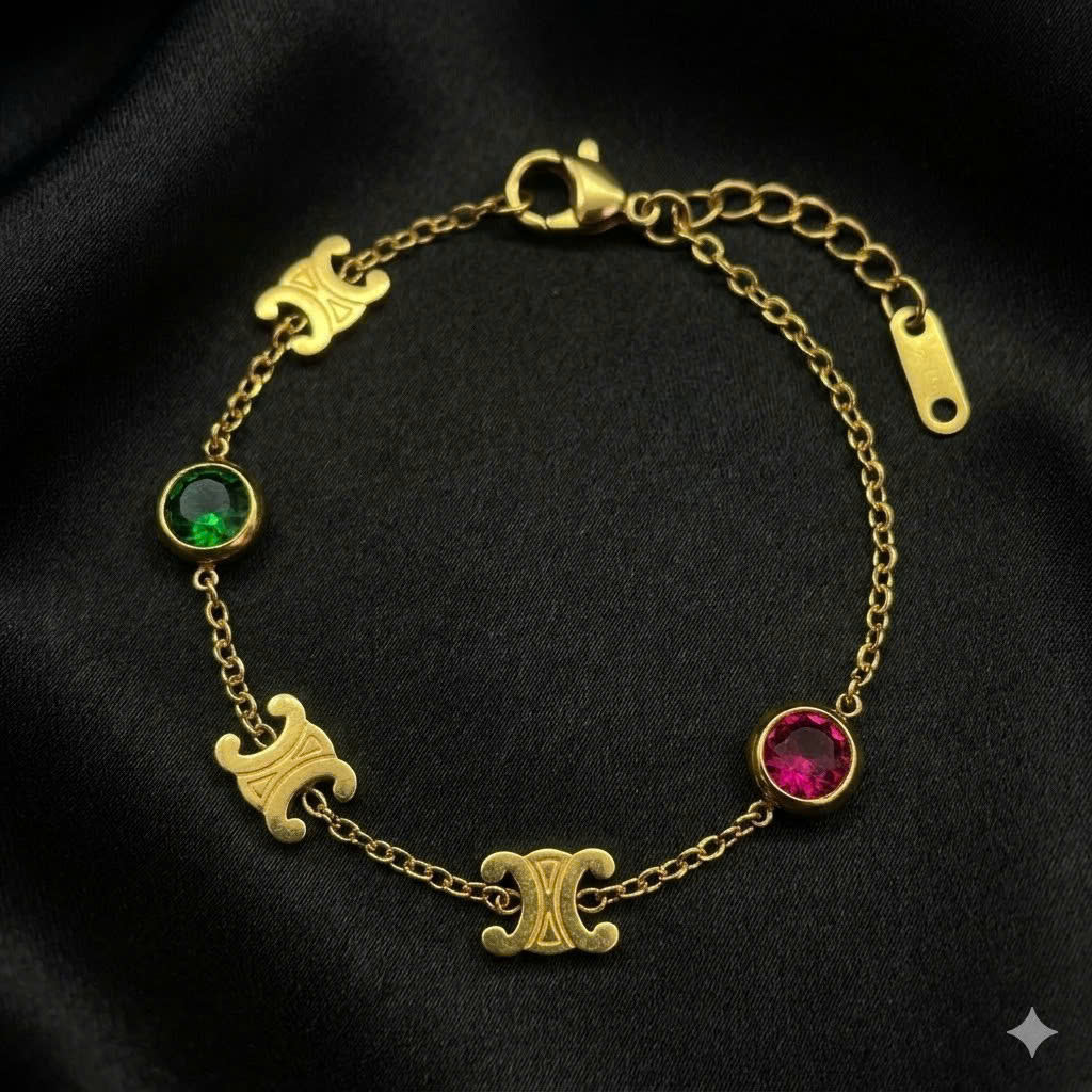 Vòng tay titan vàng hiệu celine đá 2 màu.