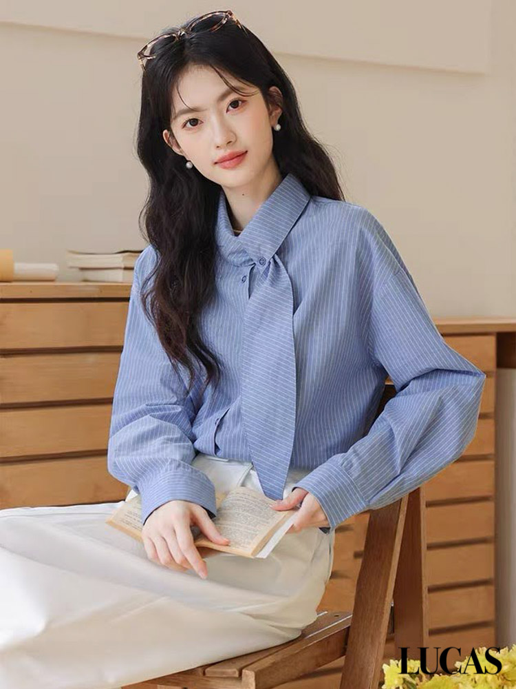 Áo sơ mi thô vải sọc cổ nơ lệch trần ly gấu STUDIO