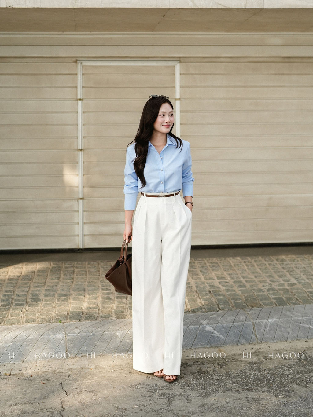 Pants with a double-pleat waistband.