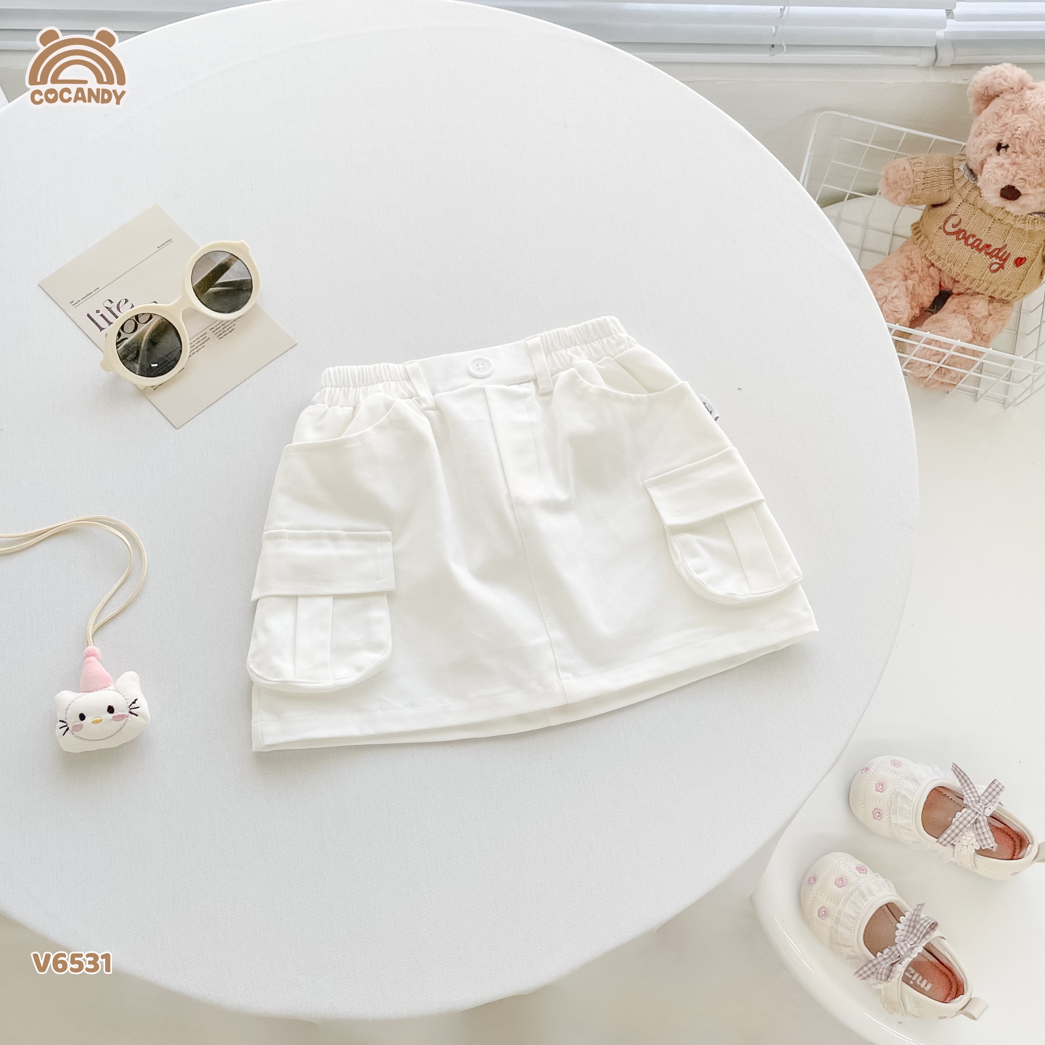Chân váy cộc kaki TRẮNG chữ A túi cạnh