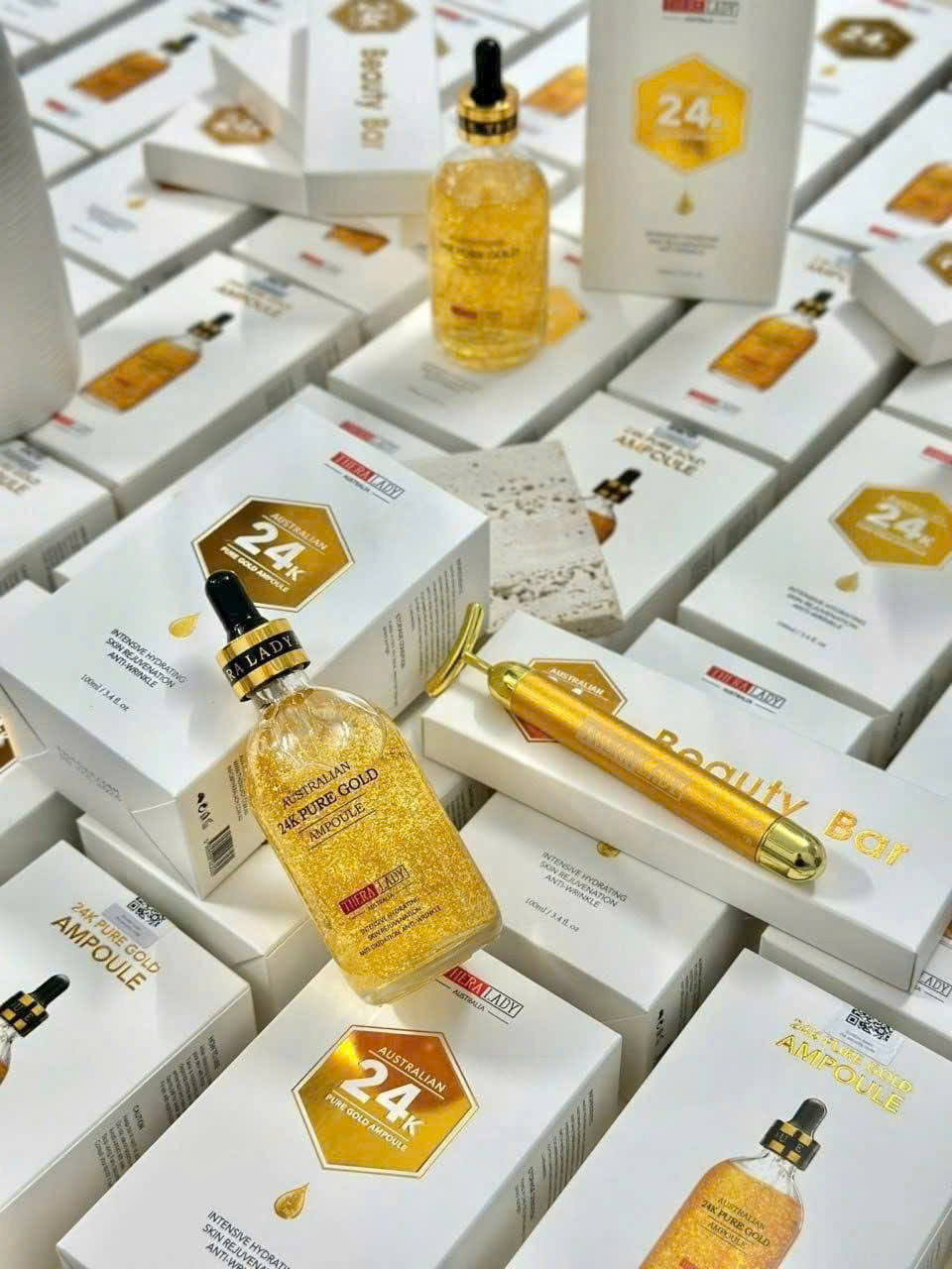 Tinh chất serum vàng 24k Úc + tặng kèm thanh lăn nâng cơ mặt_thumbnail_4