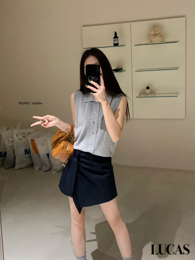 Chân váy dáng A ngắn vạt chéo xếp ly buộc vạt 1 bên