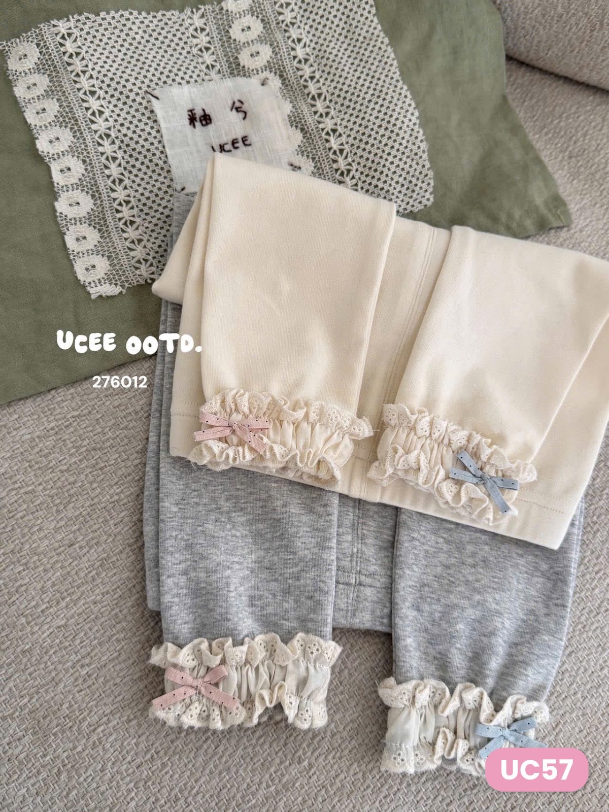 UC57 - Quần legging bo gân phối bèo ren đính nơ 2 màu be xám hãng UCEE 276012 (Sz90-130)