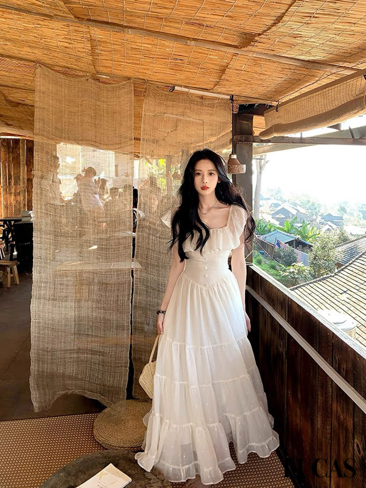 Váy maxi voan cổ vuông bèo viền cổ, tay hạ eo chéo đính cúc bọc, chân váy xòe nối tầng_thumbnail_1