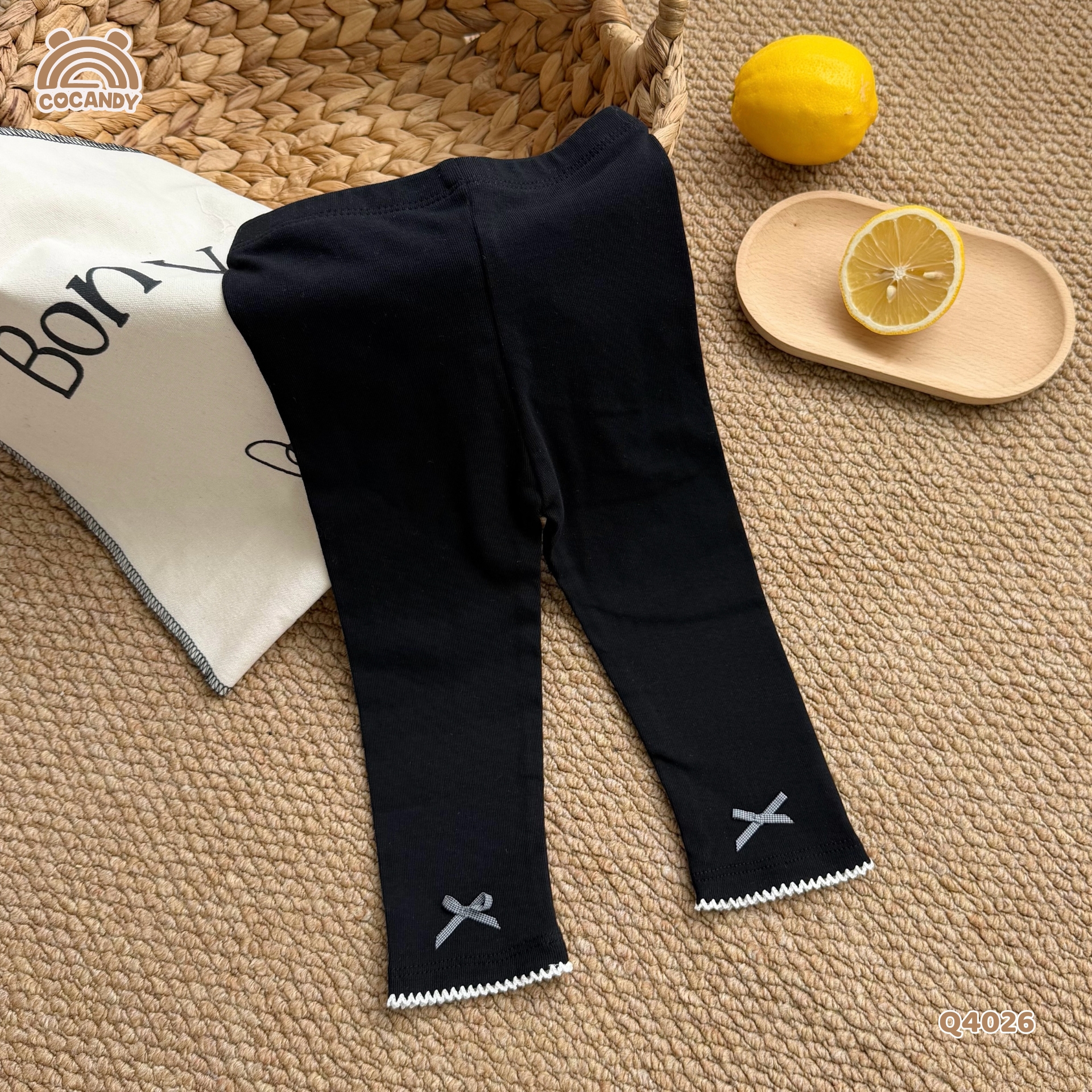 Quần dài legging ĐEN chỉ sóng nơ