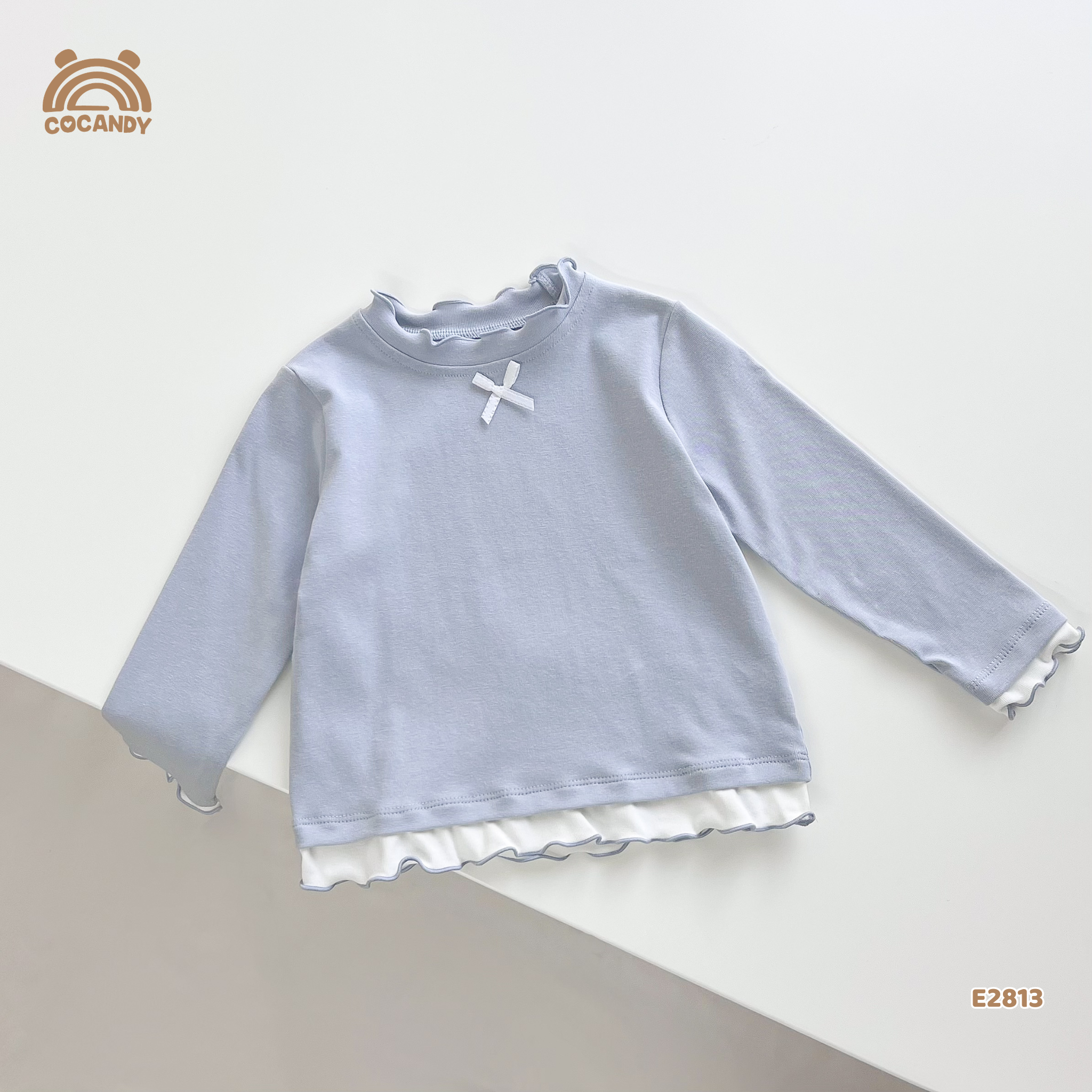 Áo dài giữ nhiệt XANH viền sóng đính nơ