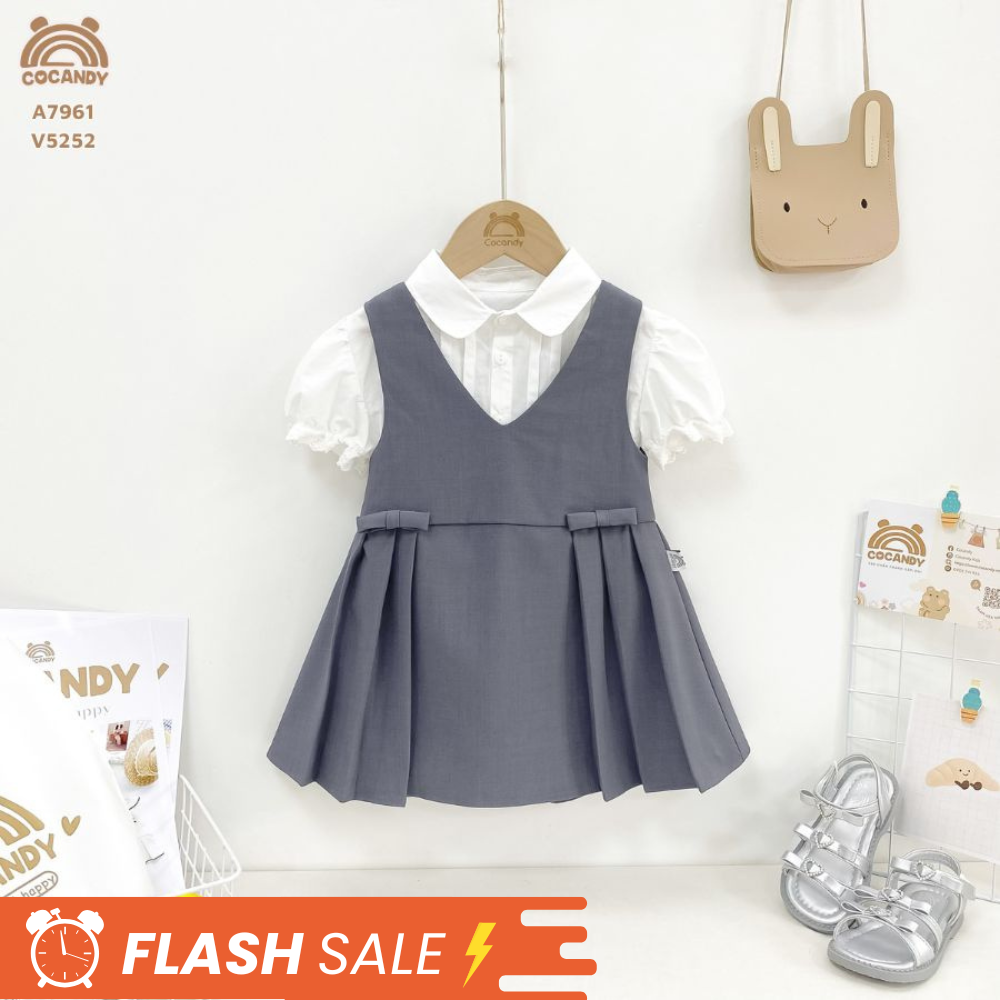 Váy yếm cộc GHI  nơ xếp ly