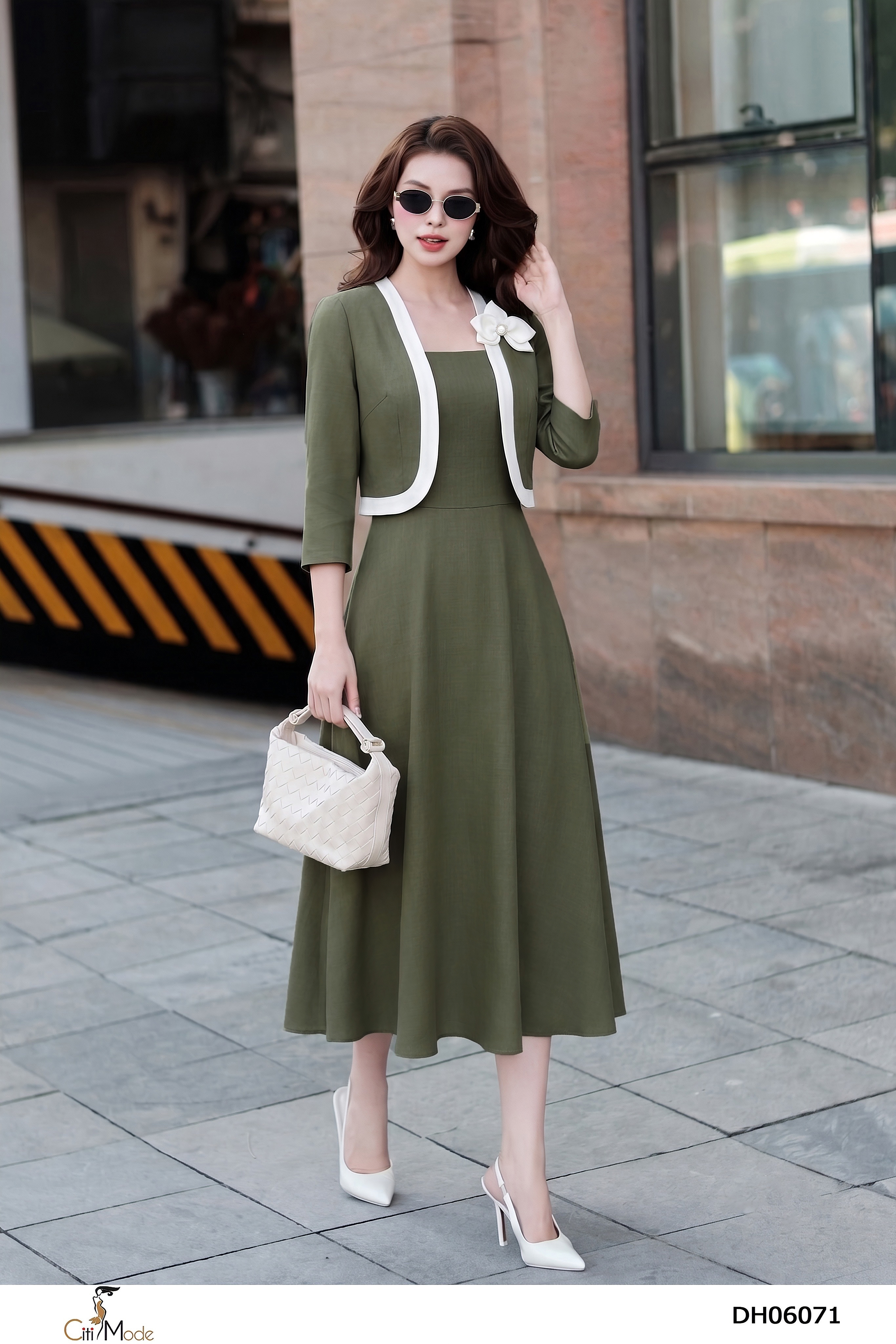 Đầm xòe xanh rêu giả sét phối viền nơ vai tay lỡ