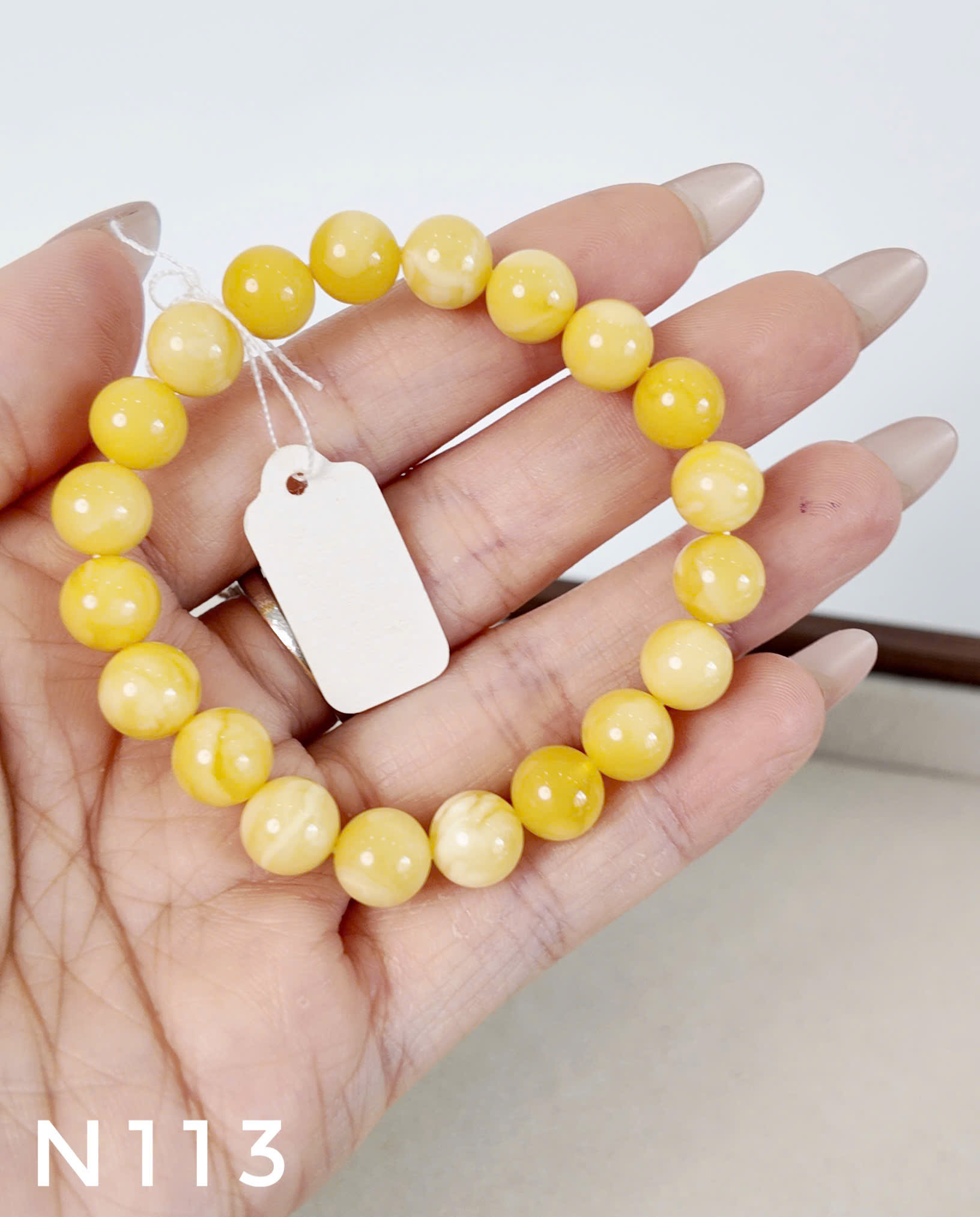 Vòng Tay Hổ Phách Hoàng Gia Vân Sữa Hạt Tròn – N113