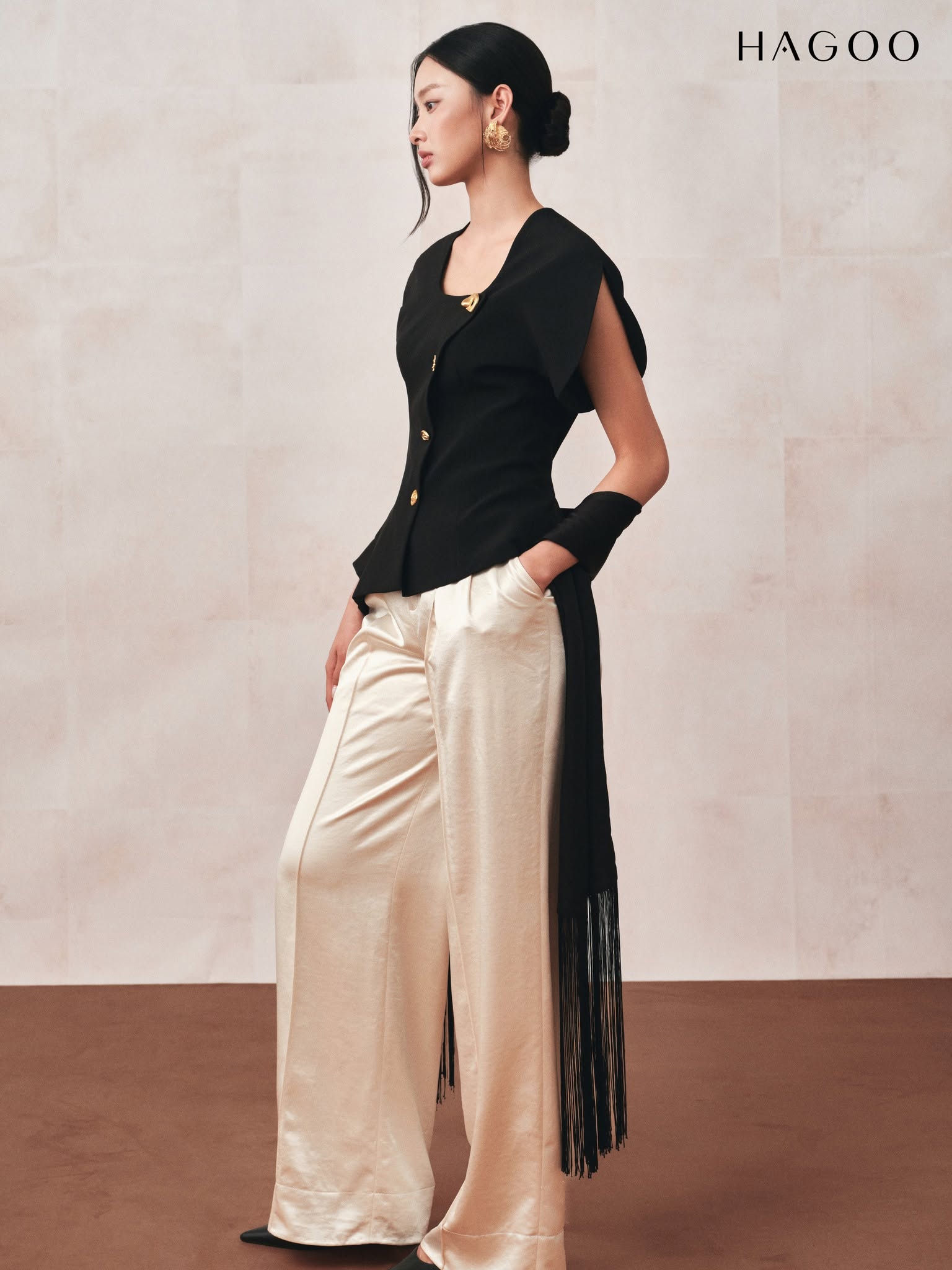 HAGOO journalist's jacket with curved sleeves and flared hem.