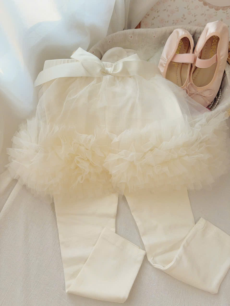 UC60 - Quần legging liền váy tutu lưới bồng đính nơ 2 màu be xám hãng UCEE 276073 (Sz90-140)