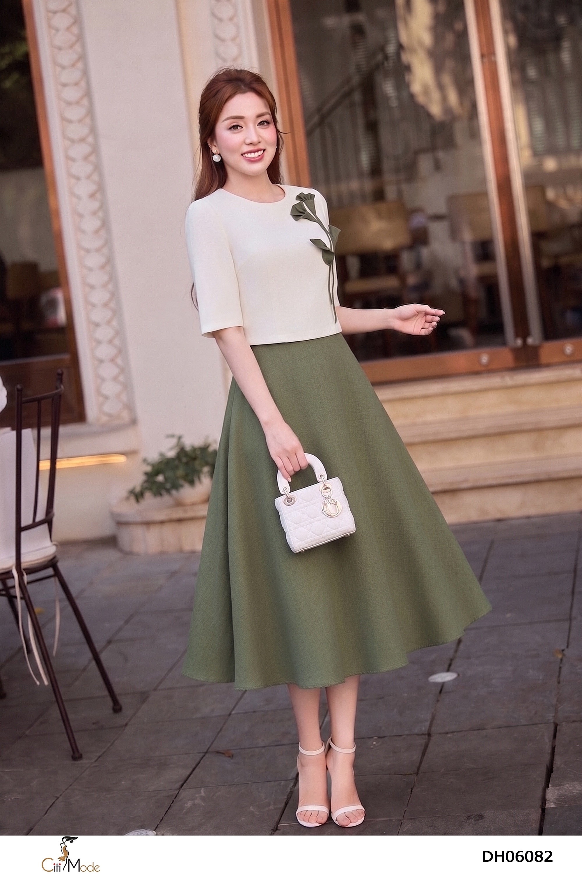 Đầm xòe xanh rêu phối áo croptop đính hoa tay lỡ