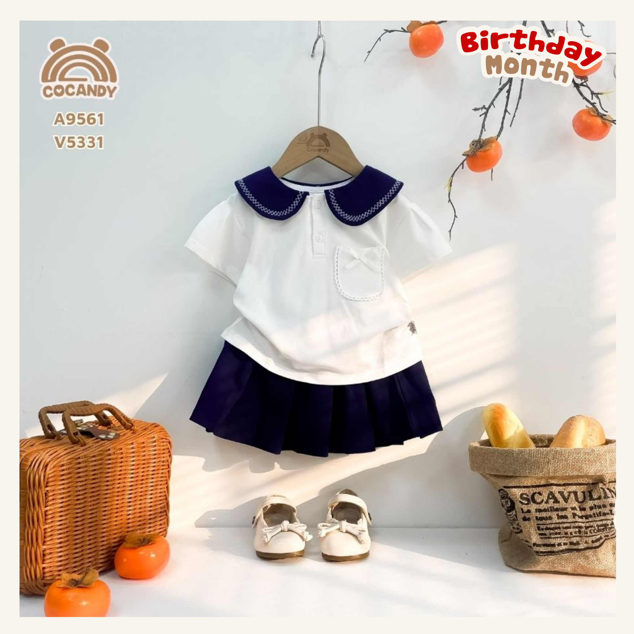 Áo cộc polo  TRẮNG cổ sen xanh than phối nơ