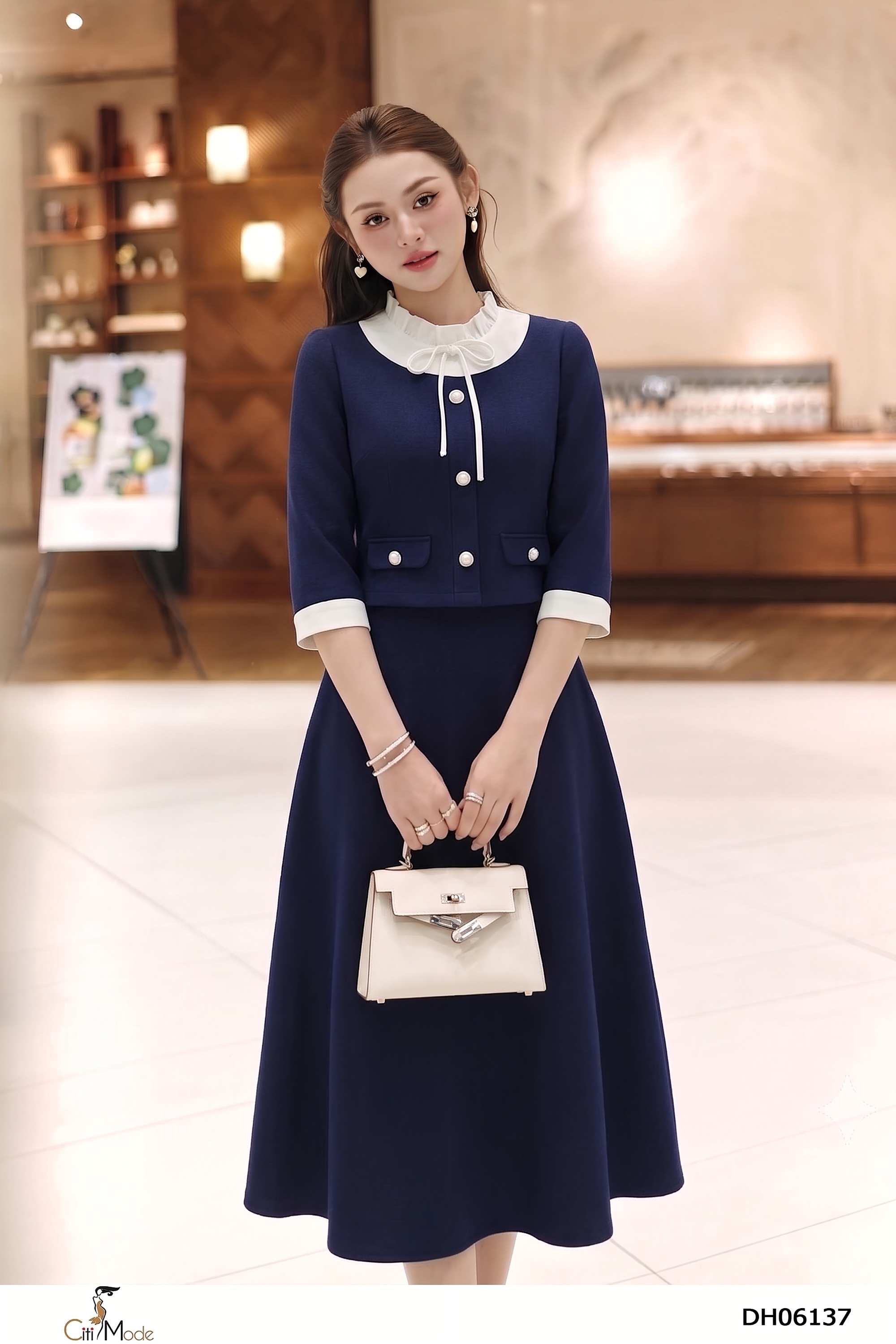 Đầm xòe xanh đen giả set cổ nhún phối trắng tay lỡ