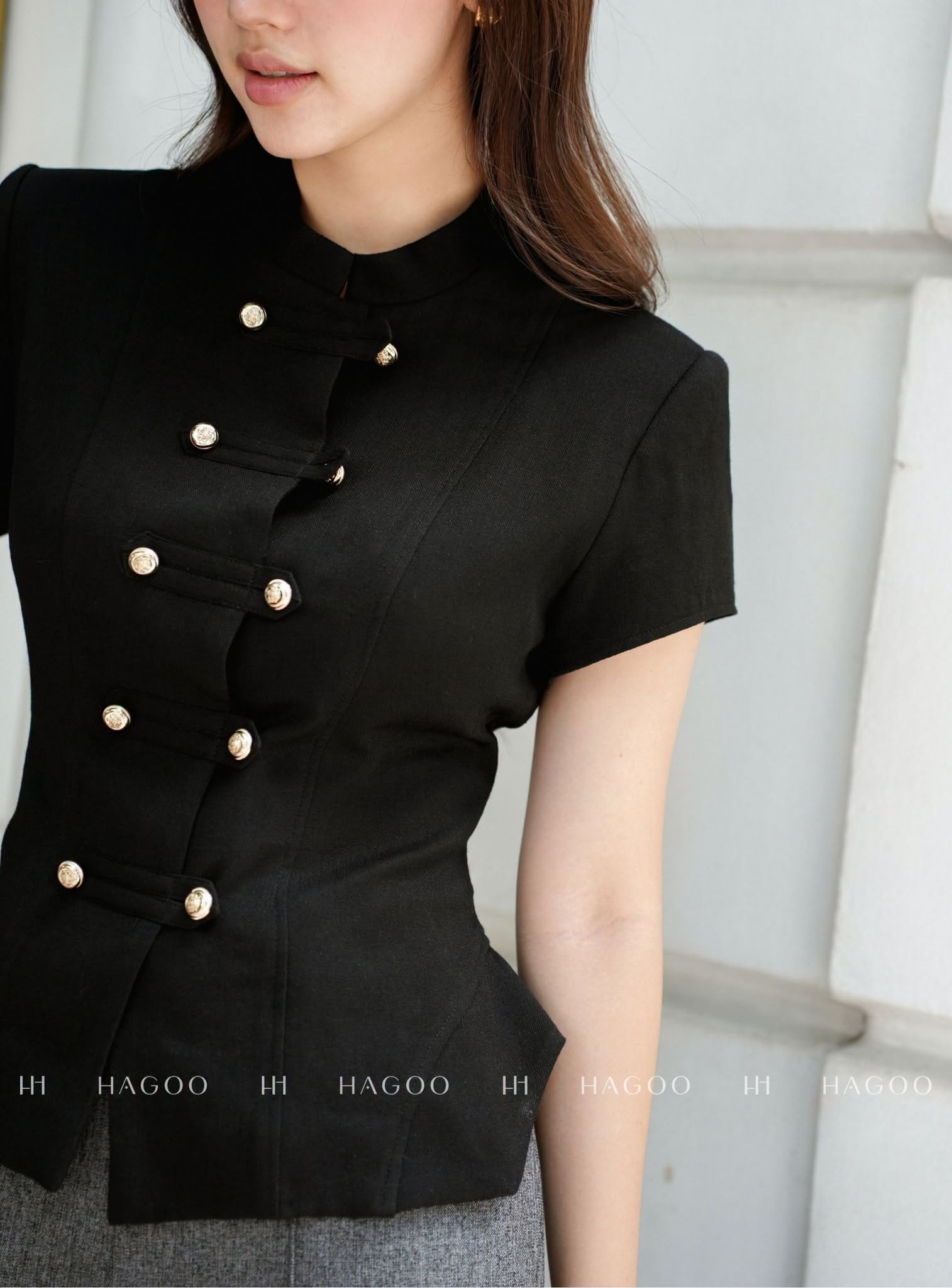 HAGOO journalist's jacket with decorative buttons.