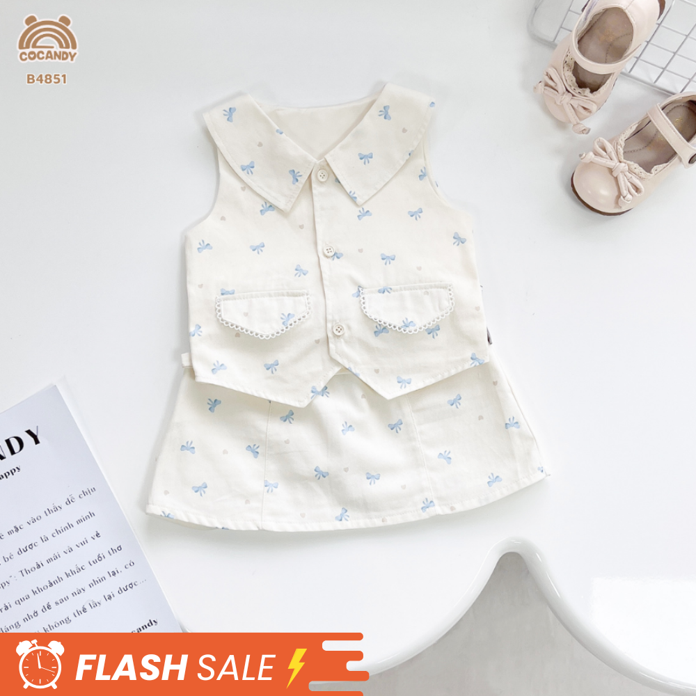 Bộ cộc kaki BE sát nách họa tiết nơ xanh