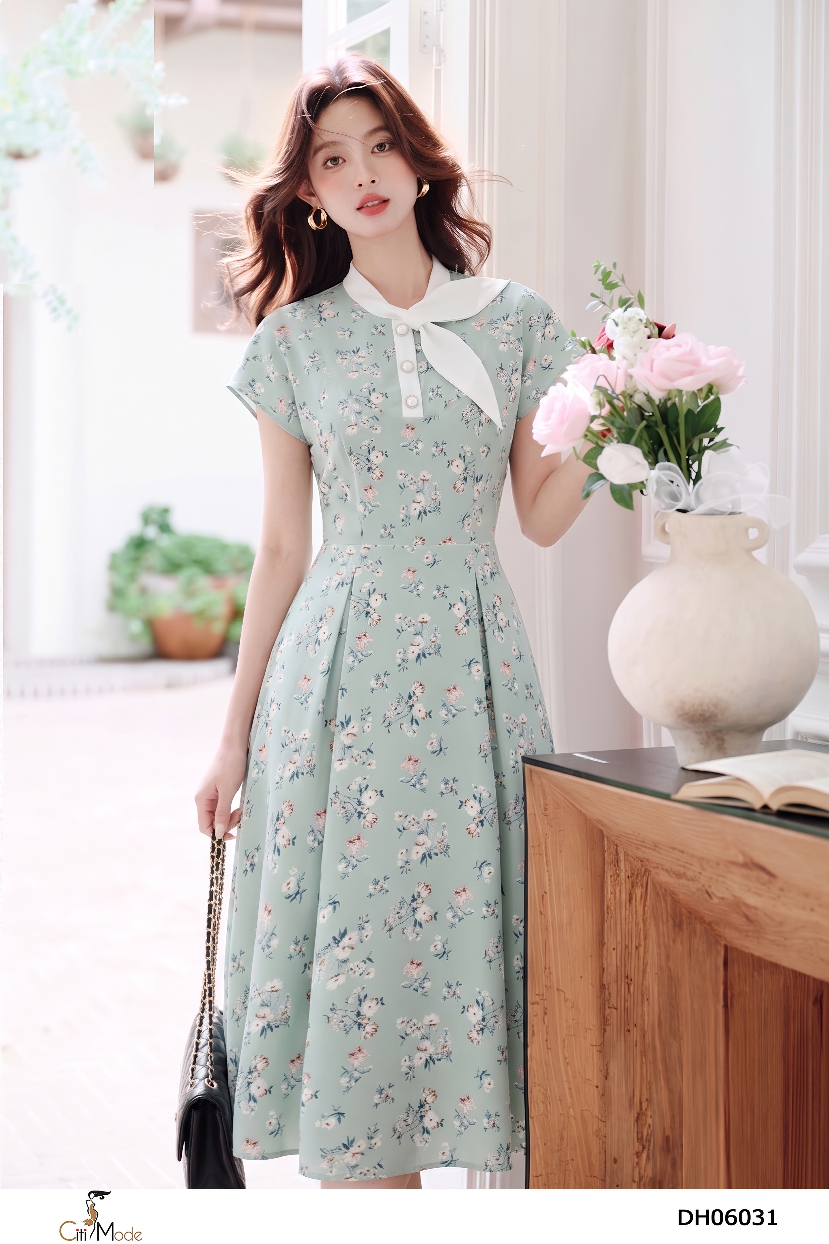 Đầm xòe hoa xanh cổ nơ lệch tay chờm
