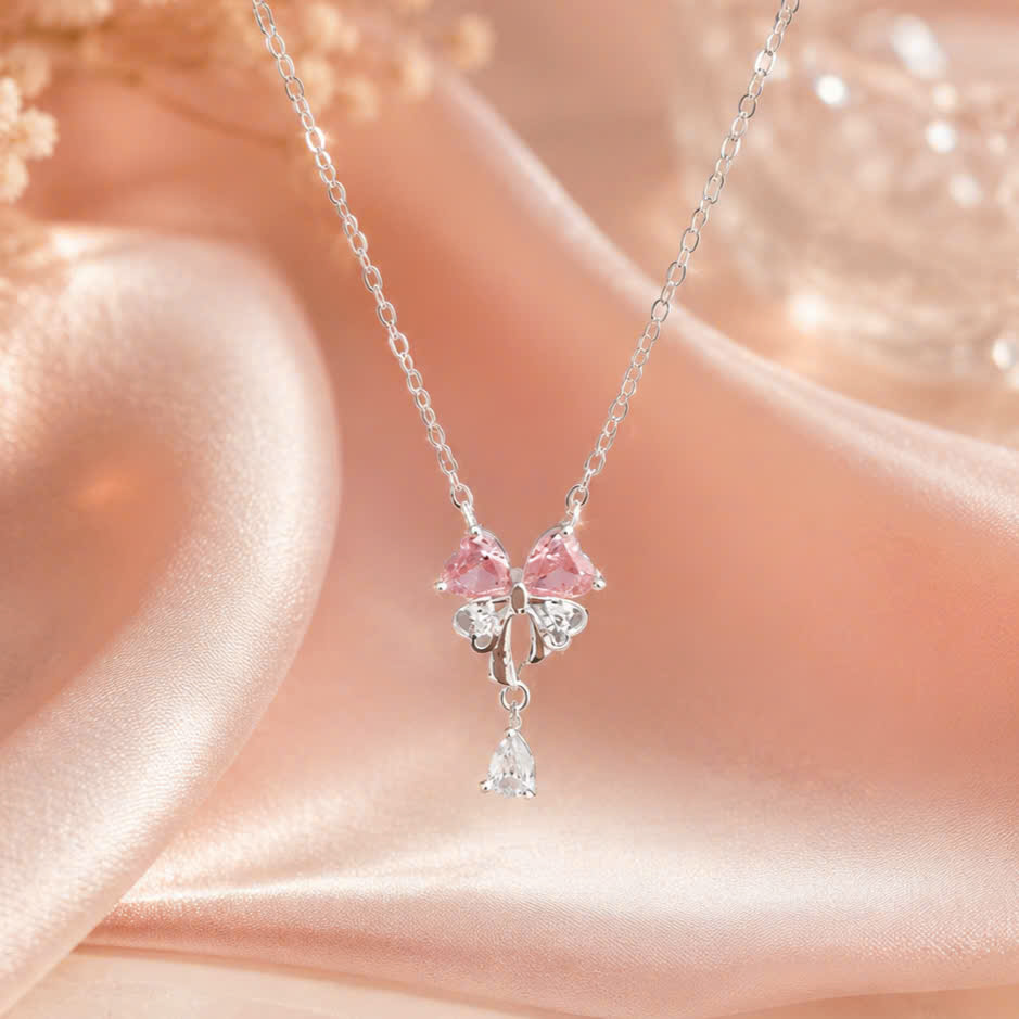 Dây chuyền nơ liền mặt NS002 hai màu Hồng - Trắng