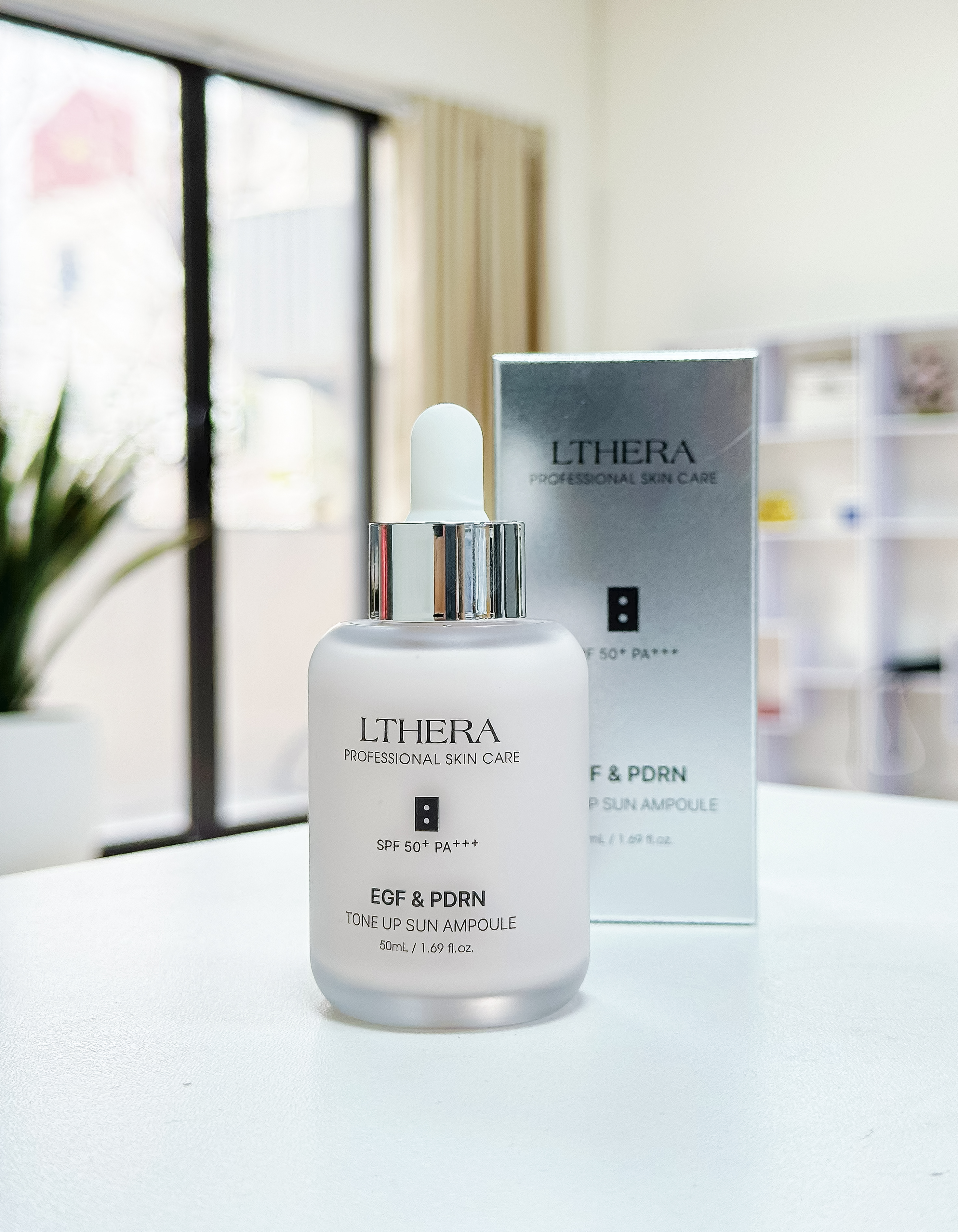 Sản phẩm giúp chống nắng cho da LTHERA EGF & PDRN TONE UP SUN AMPOULE SPF50+ PA+++, 50ml/lọ, nhãn hàng LTHERA