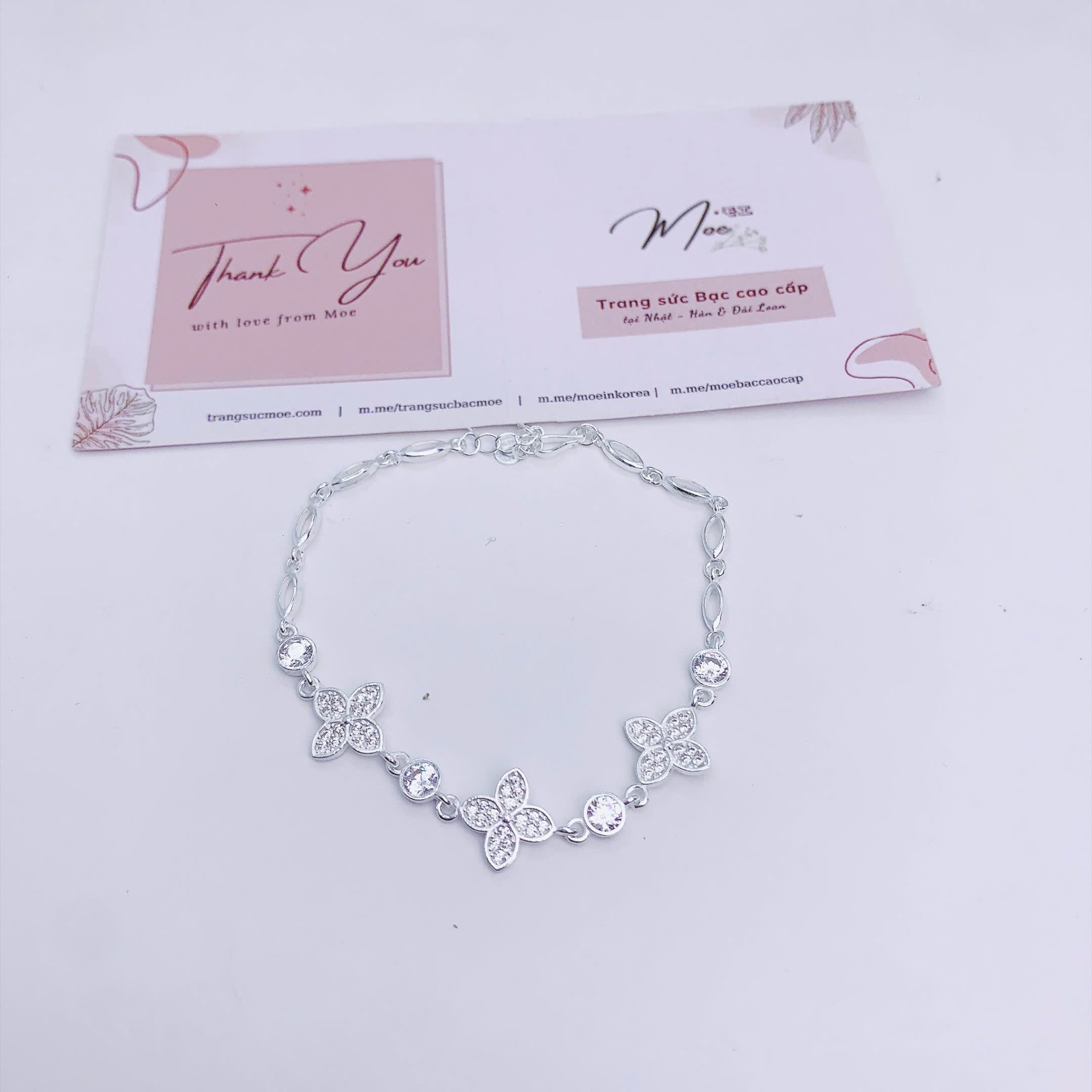 LT660 - Lắc tay cỏ 4 lá con thoi