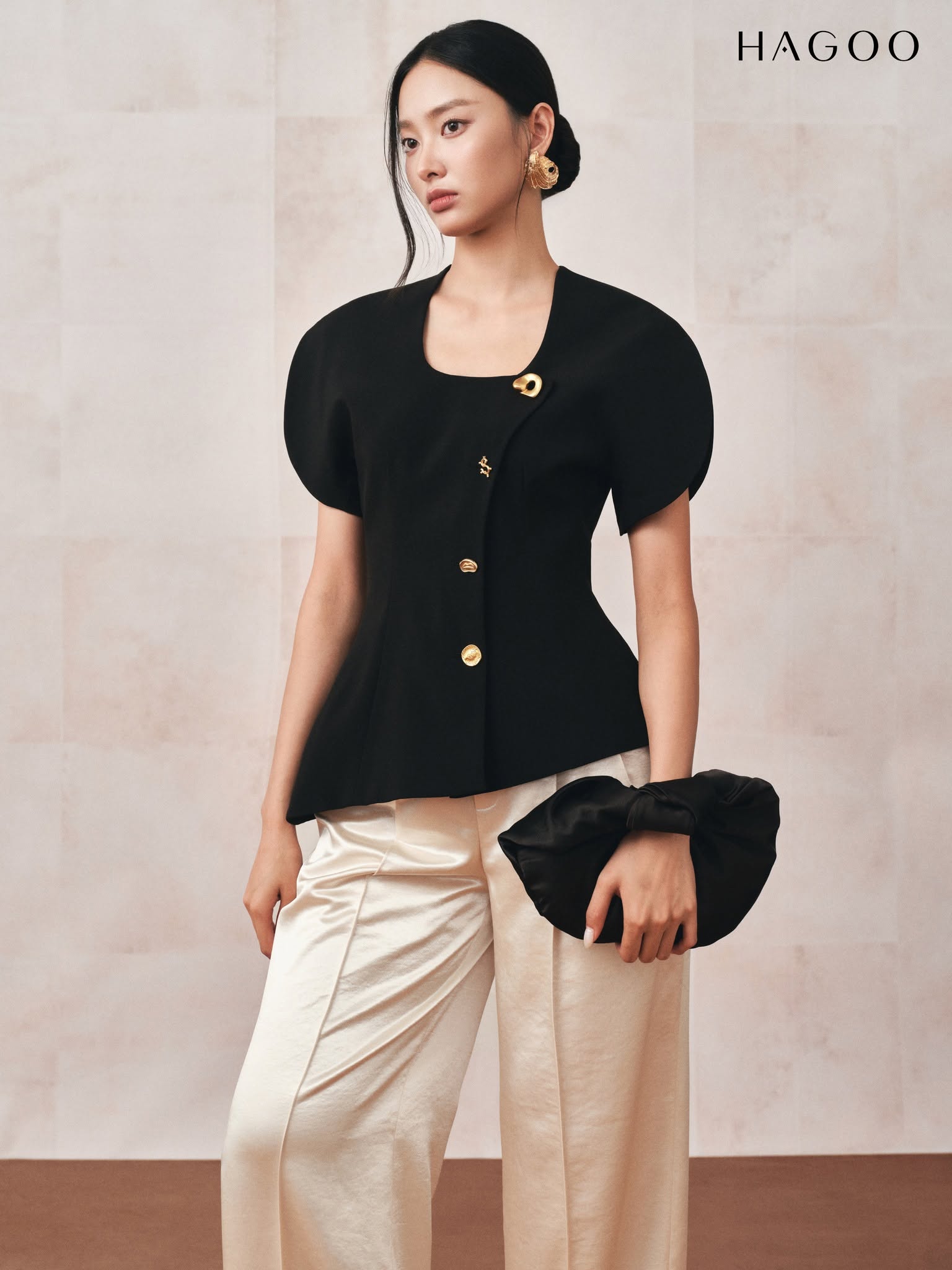 HAGOO journalist's jacket with curved sleeves and flared hem.