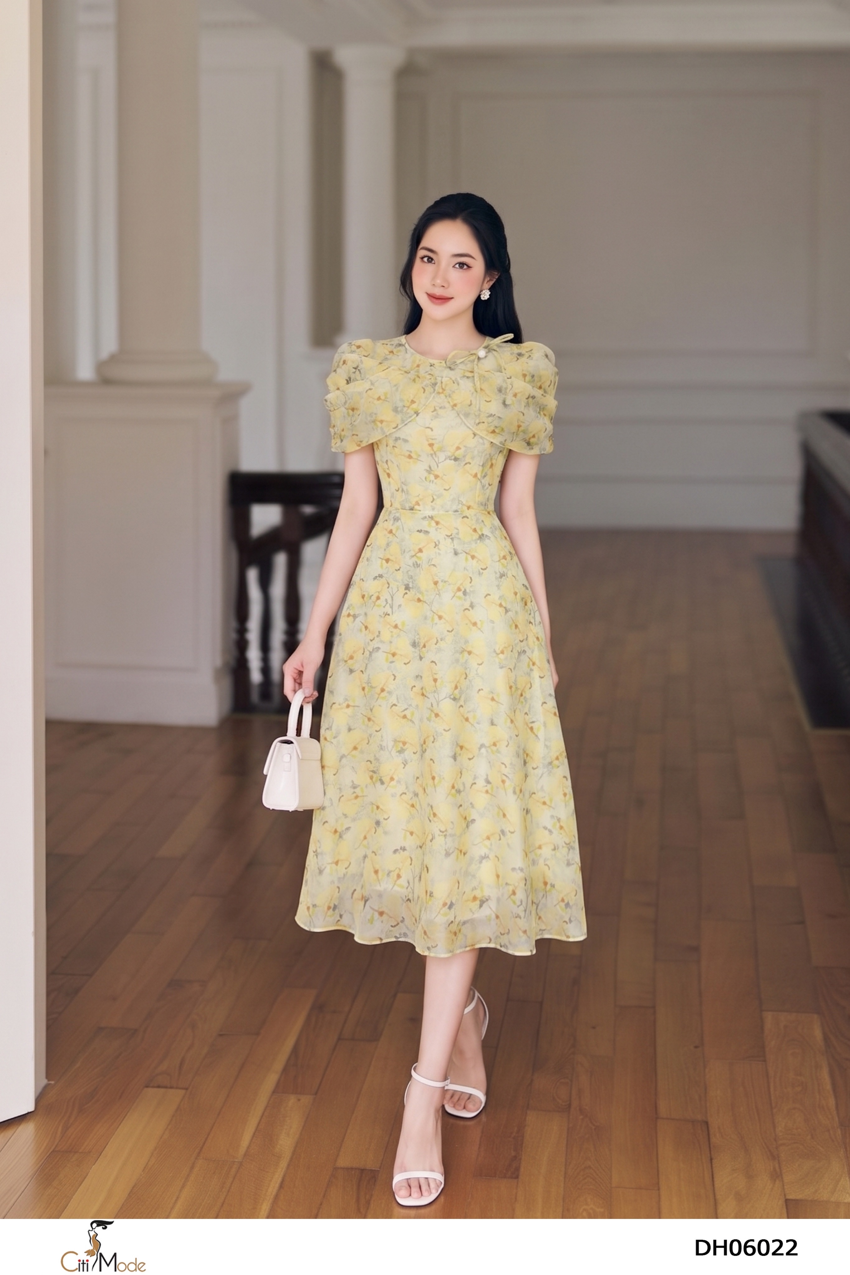 Đầm xòe hoa vàng nhí tay phủ nhún cách điệu cổ tròn đính nơ
