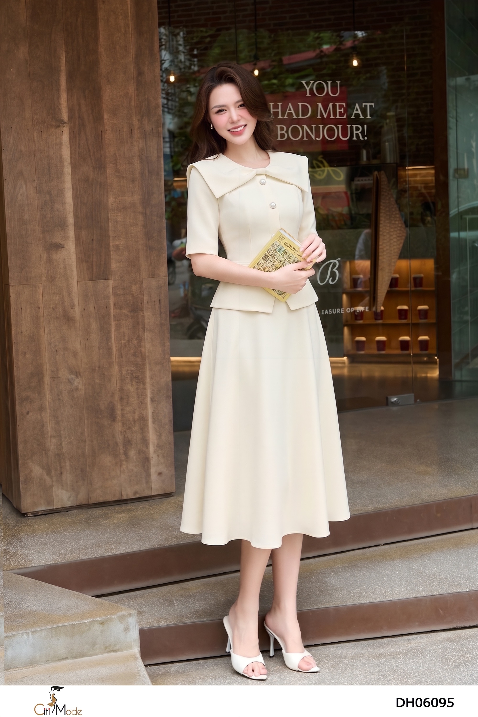 Đầm xòe trắng, cổ tròn cách điệu tay lỡ