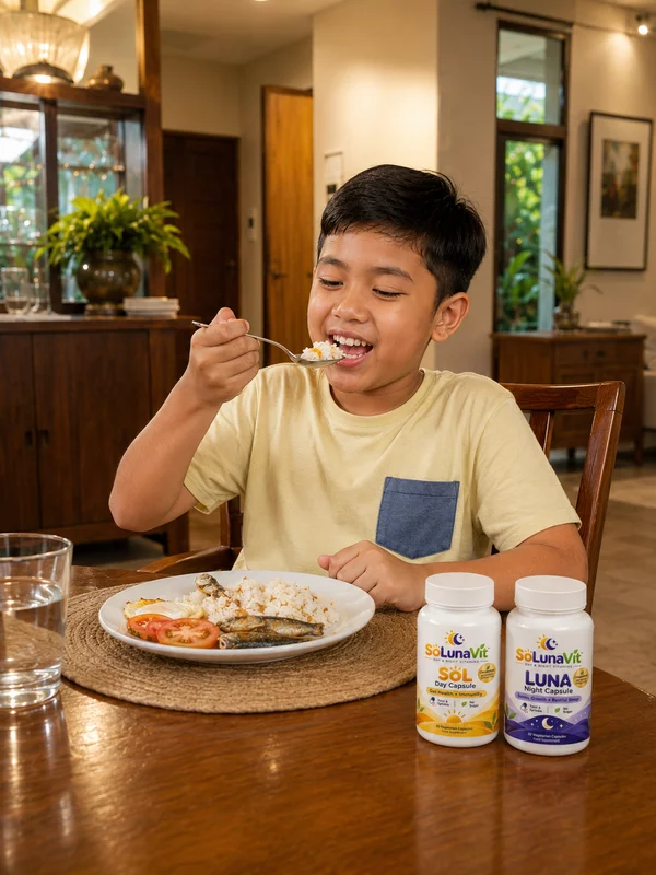 Boy eating a home-cooked meal with SoLunaVit SOL and LUNA on the table