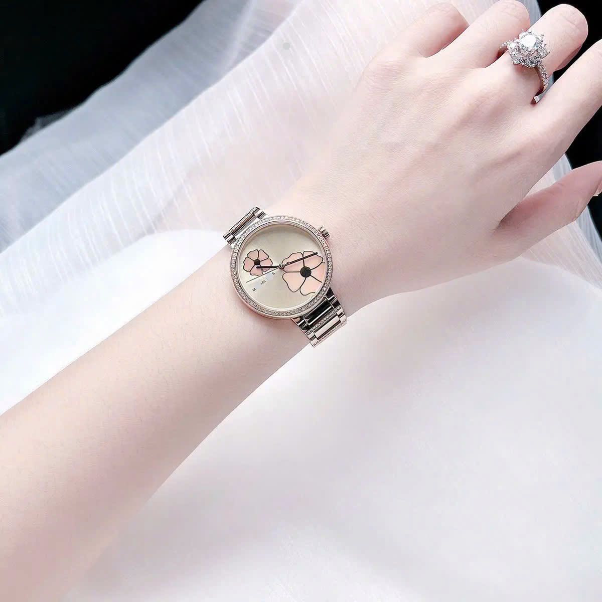 ĐỒNG HỒ NỮ MK mặt Bông Hoa