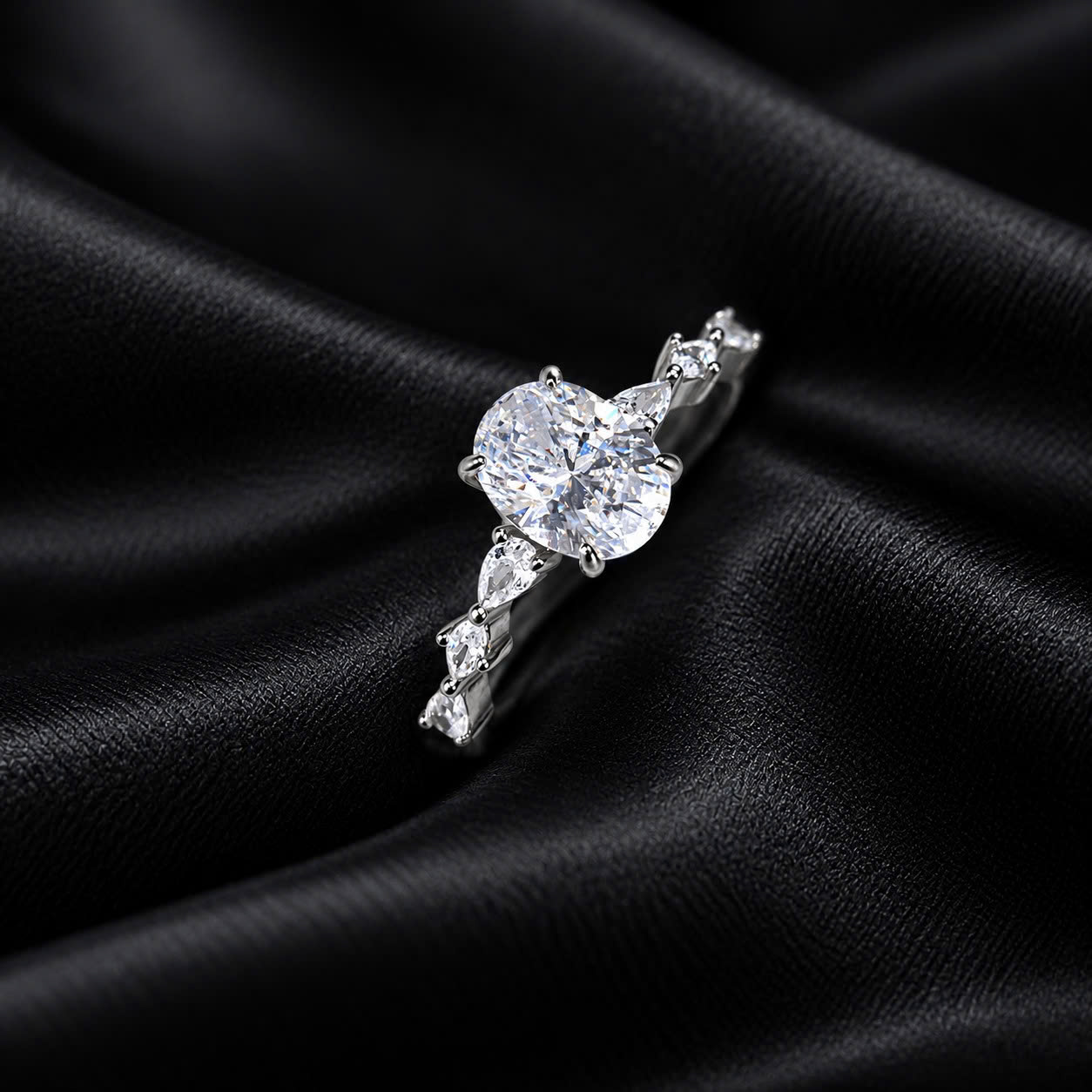 nhẫn bạc xi bạch kim kim cương bầu dục size 7